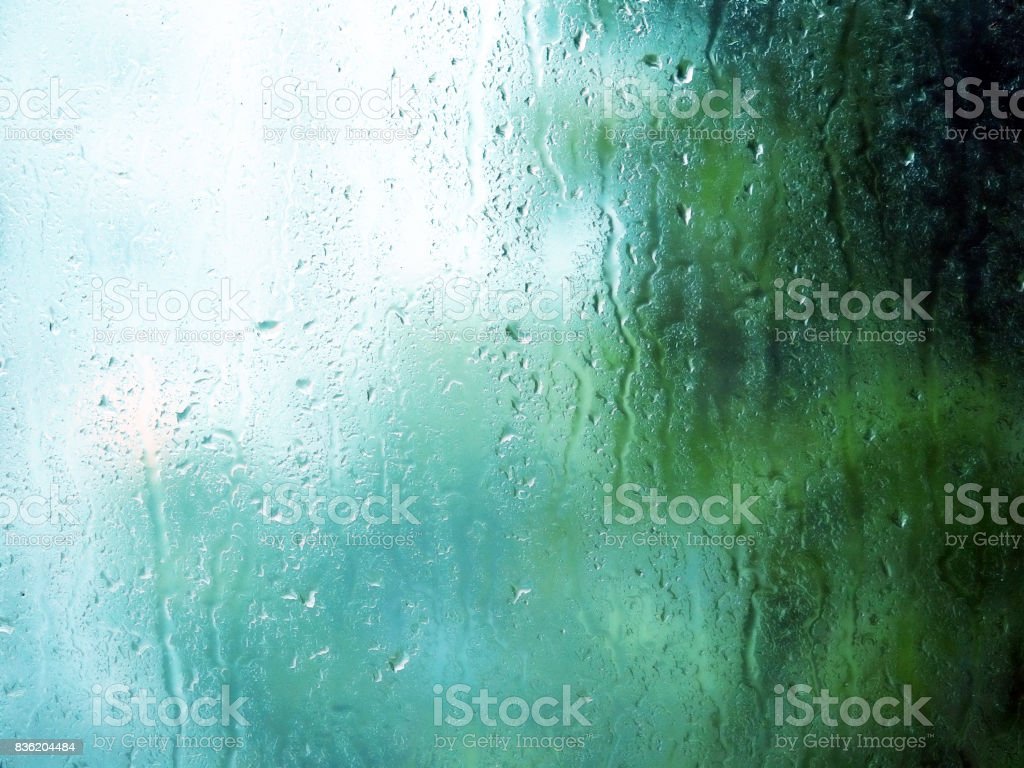 Rain Drops And Water Stains On Glass Window In Rainy Summer Day Image Now