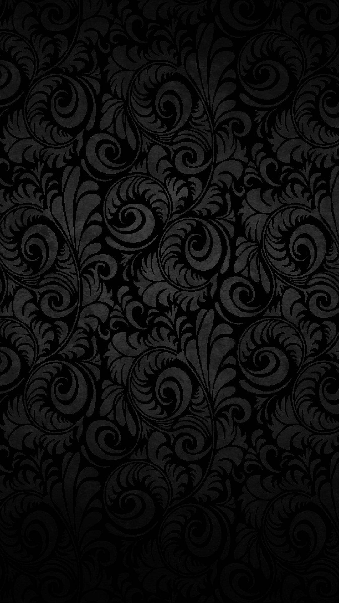 Download Plain Black With Ornate Leaf Pattern Wallpaper
