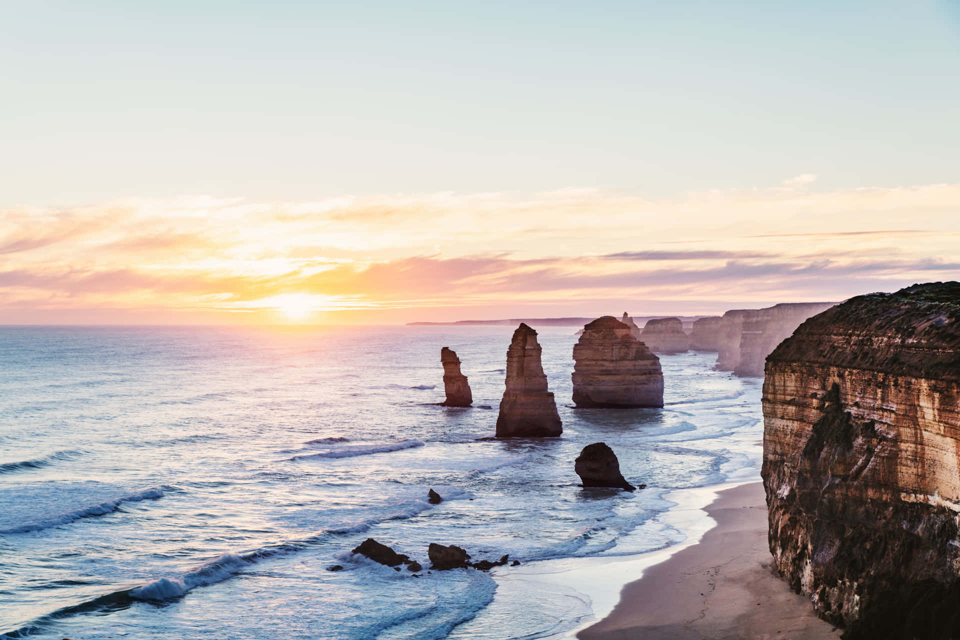 Download Twelve Apostles In Victoria Australia During Sunrise Wallpaper