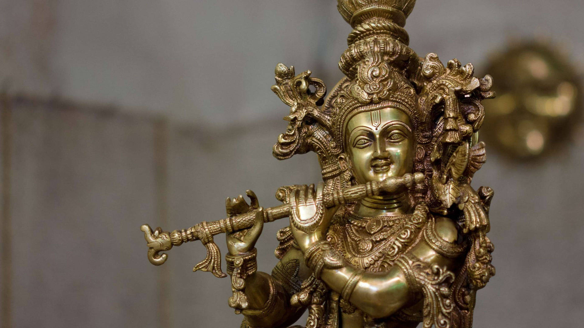 Download Golden Statue Of Krishna 4k Wallpaper