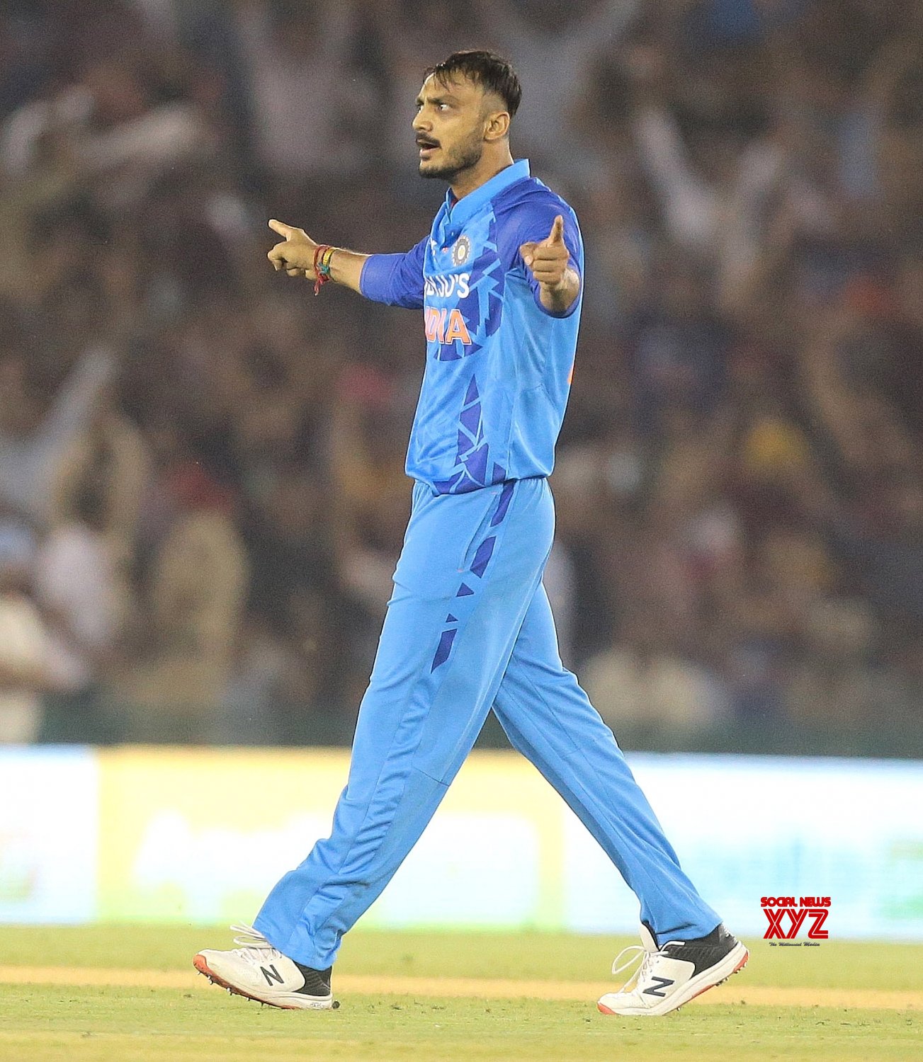 Mohali:India's Axar Patel, celebrates the dismissal of Australia's captain Aaron Finch. #Gallery News XYZ