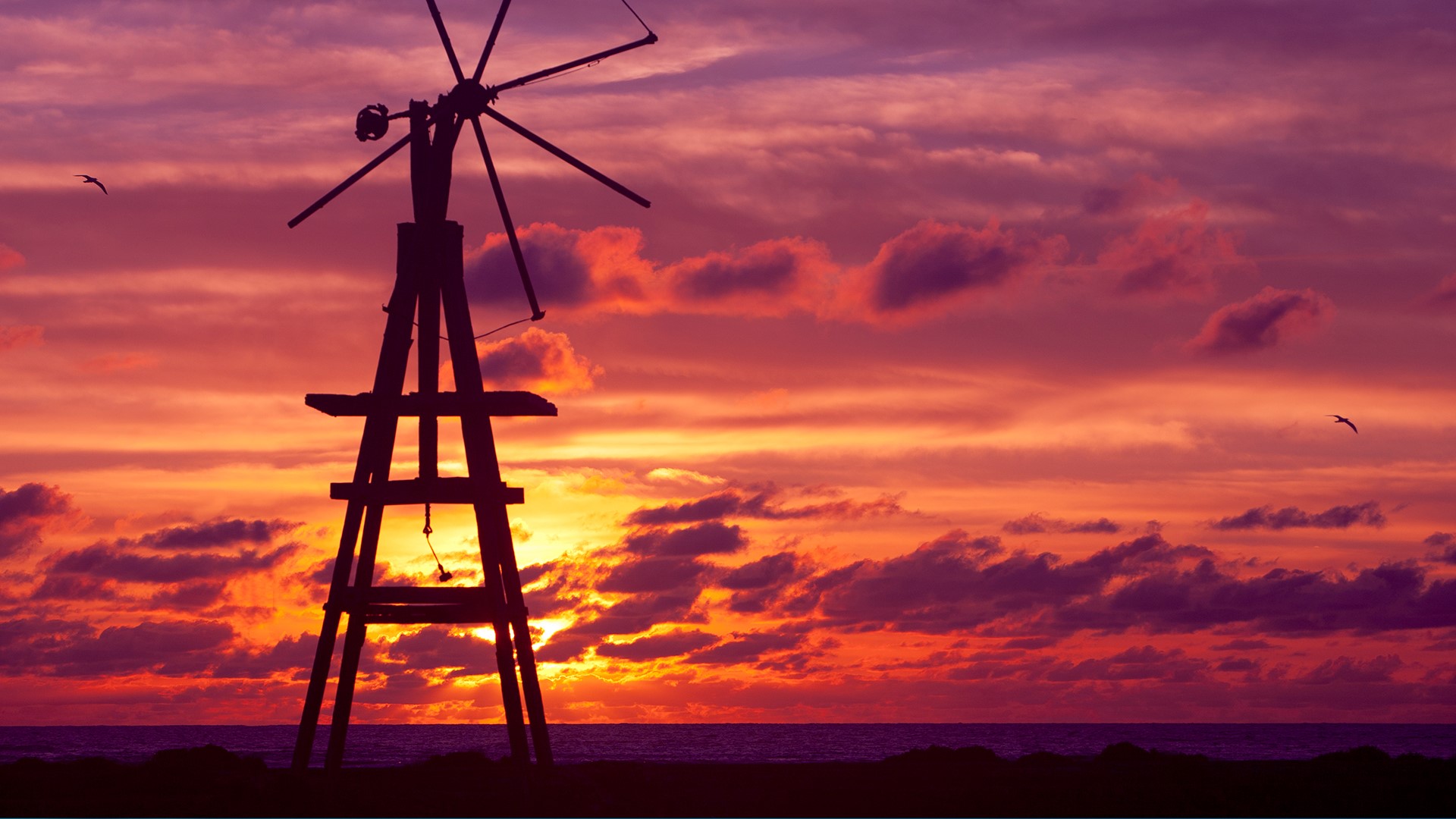 Orange sunset on Lanzarote near La Santa, Canary Islands, Spain. Windows 10 Spotlight Image