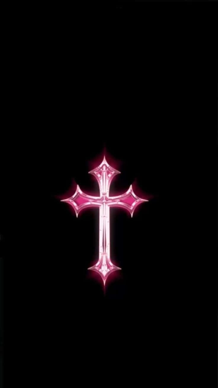 Download A Pink Cross On A Black Background Wallpaper