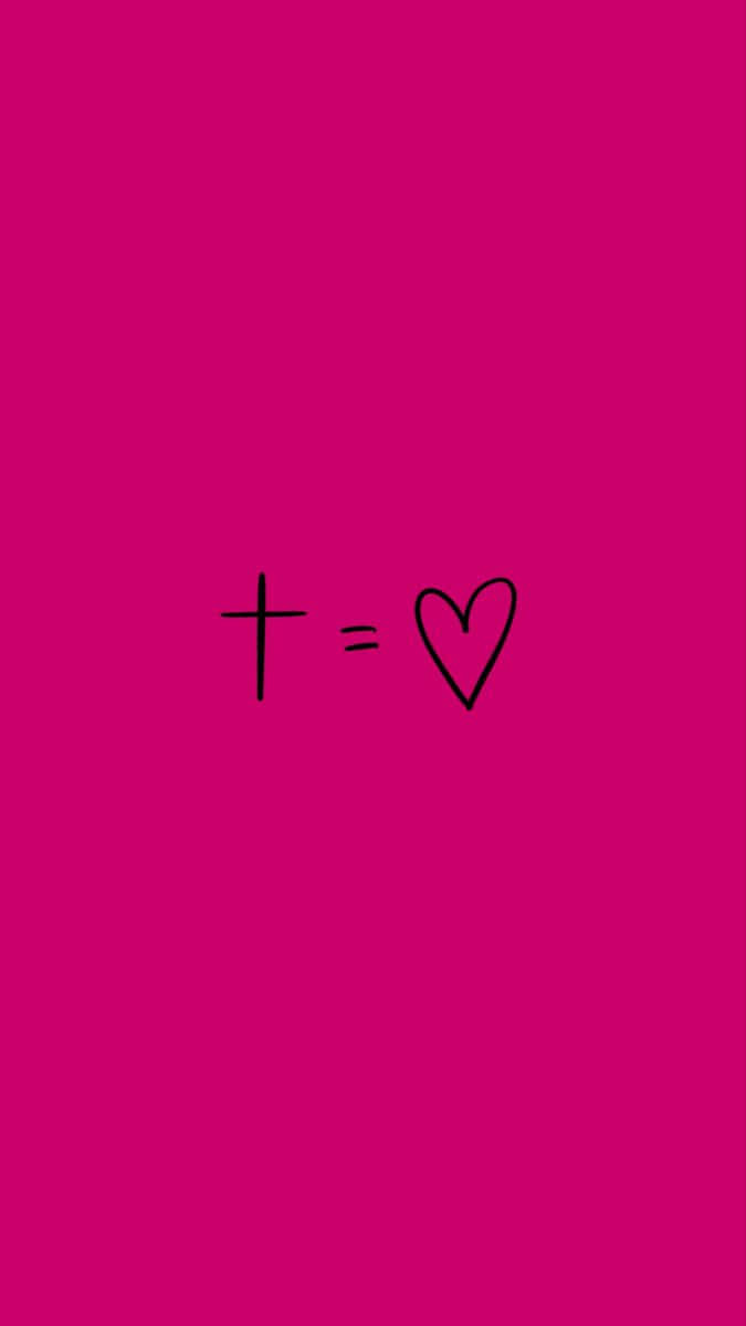 Download A Pink Background With A Cross And A Heart Wallpaper