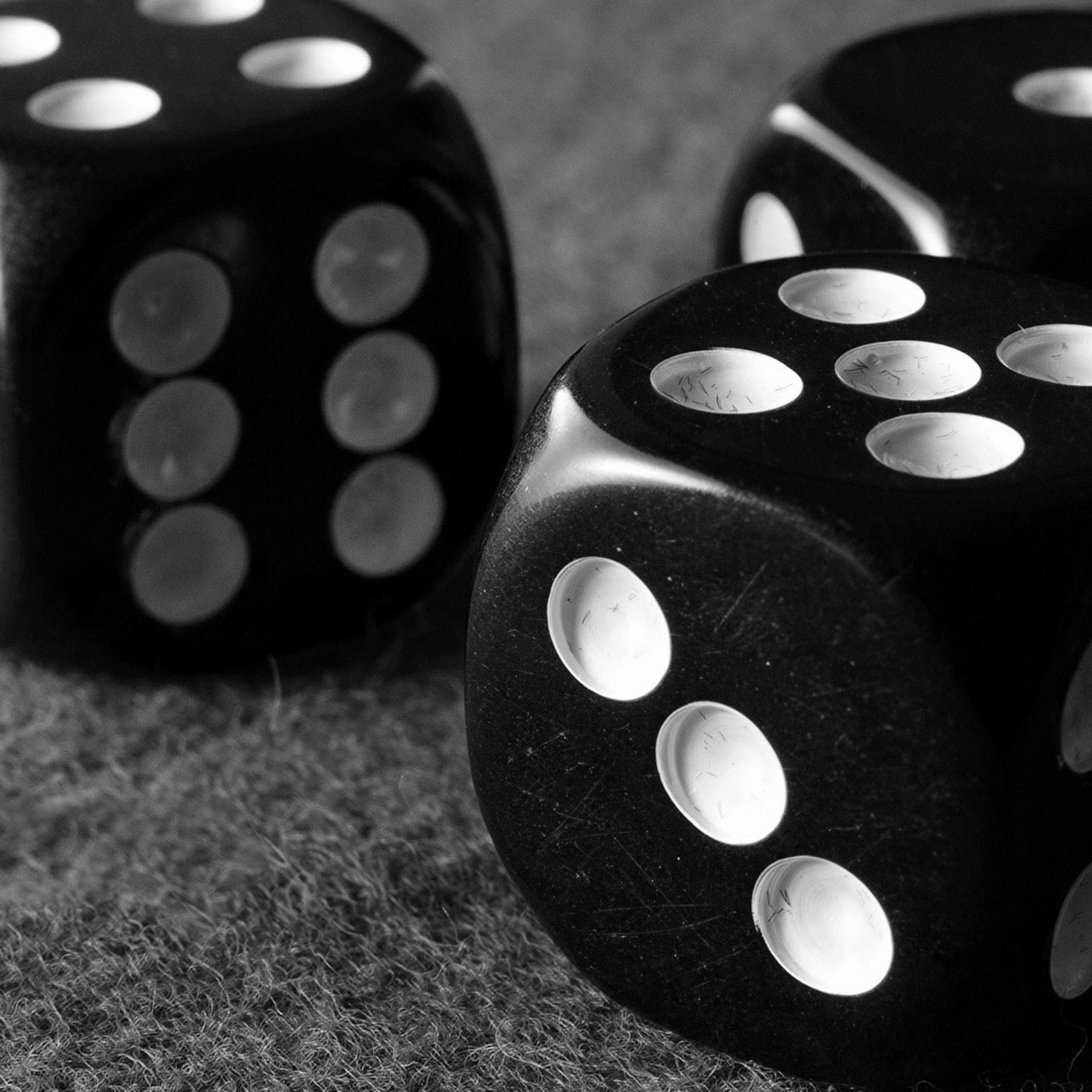 Three black dice