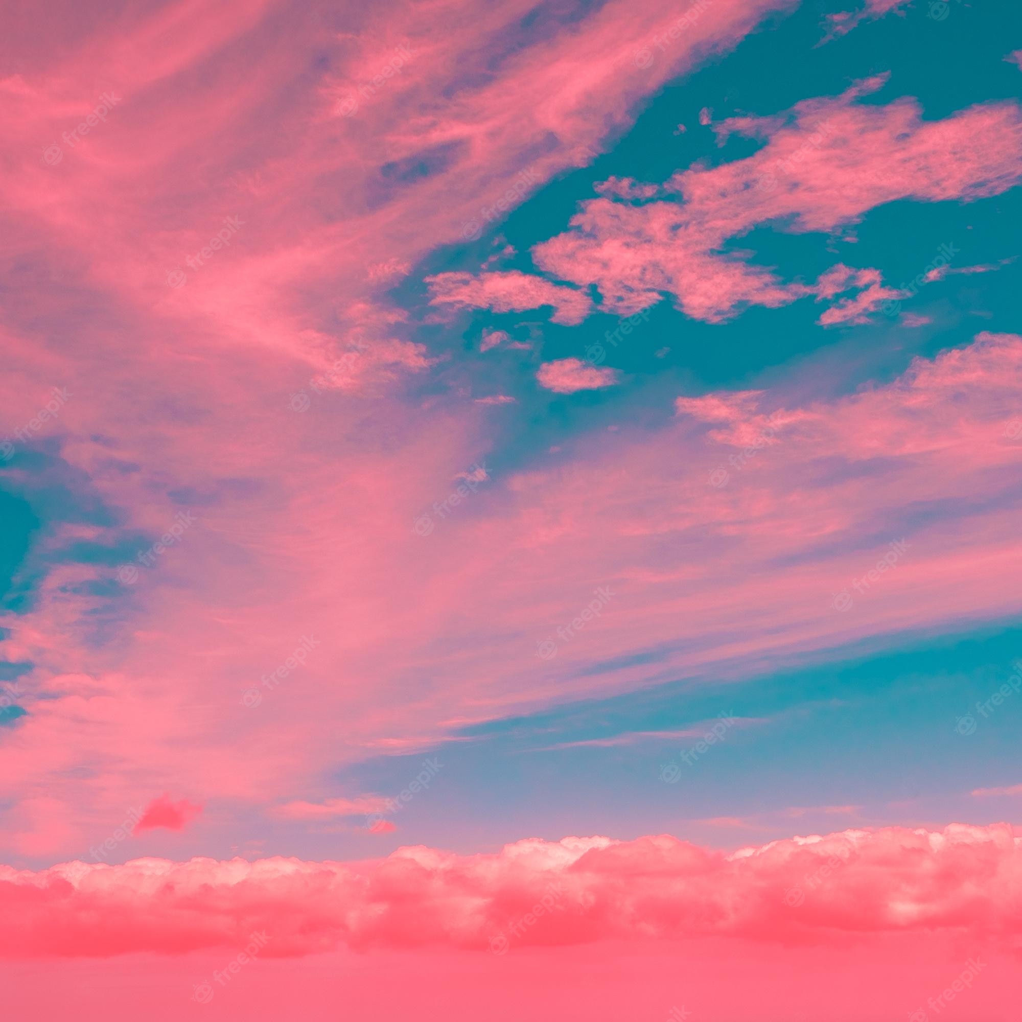 Premium Photo. Pink and blue sky surreal view ideal for postcard prints phone cases print tshirts stylish nature visual spirits wallpaper