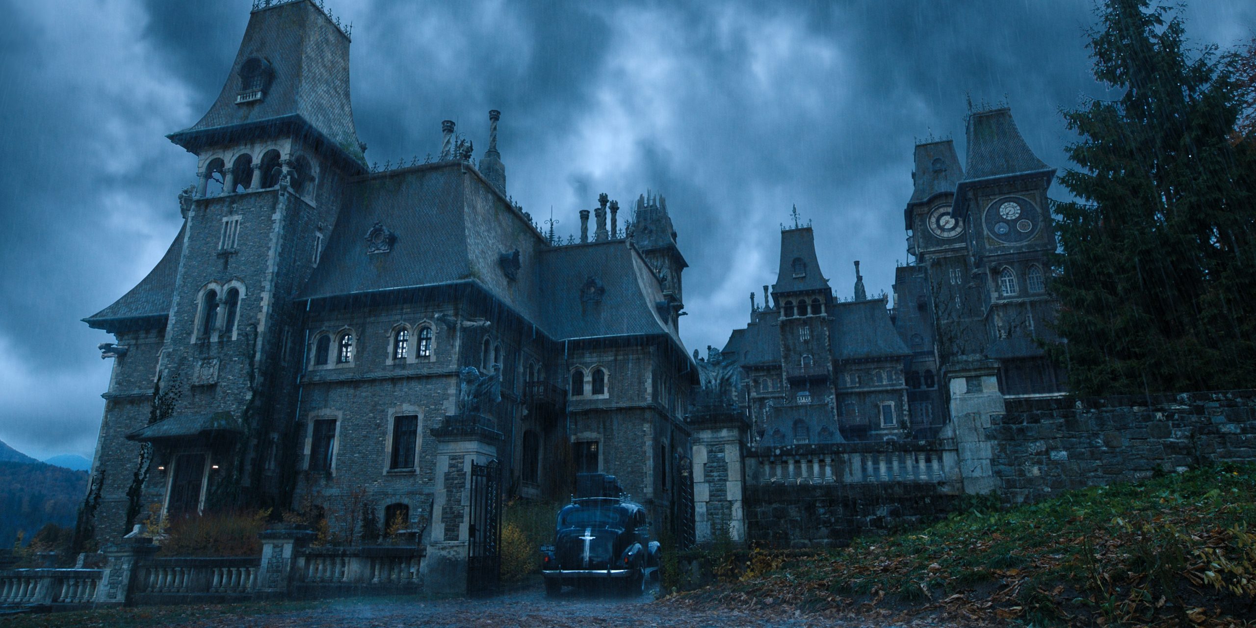 Wallpaper, movies, dark, Wednesday TV series, Nevermore Academy, rain, castle, Romania, Limousine, black cars, car, trees, film stills, clock tower, Gothic, Cantacuzino Castle 2560x1280