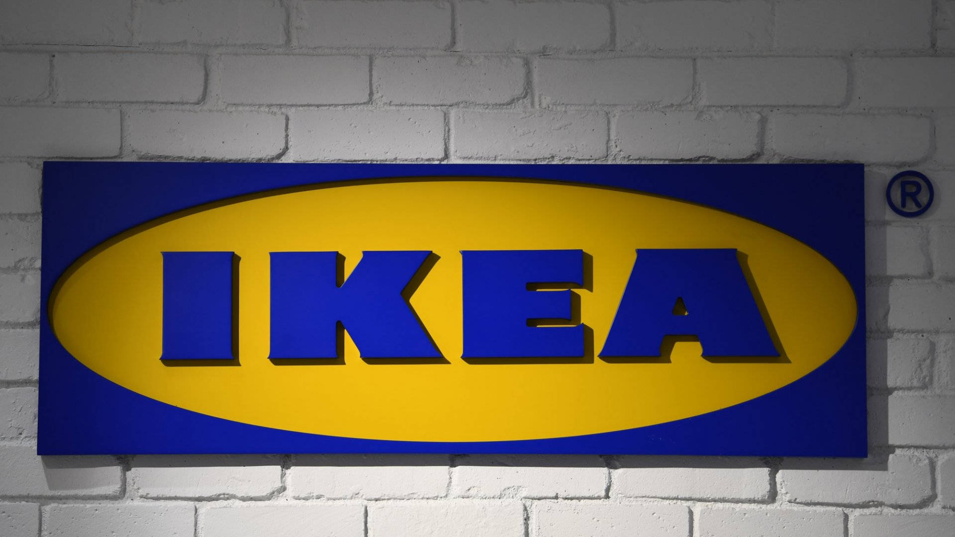 Download Ikea Logo Brick Wall Wallpaper