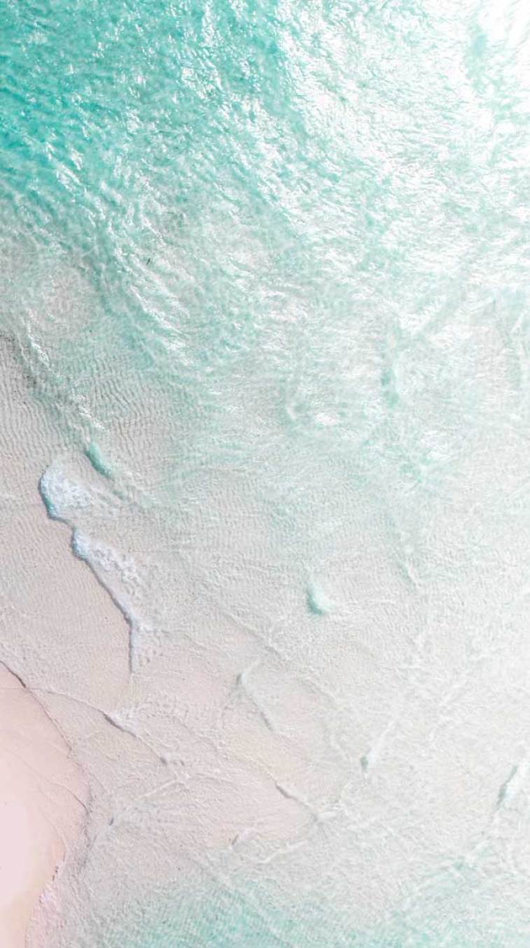 Beautiful beach clear water sea Wallpaper