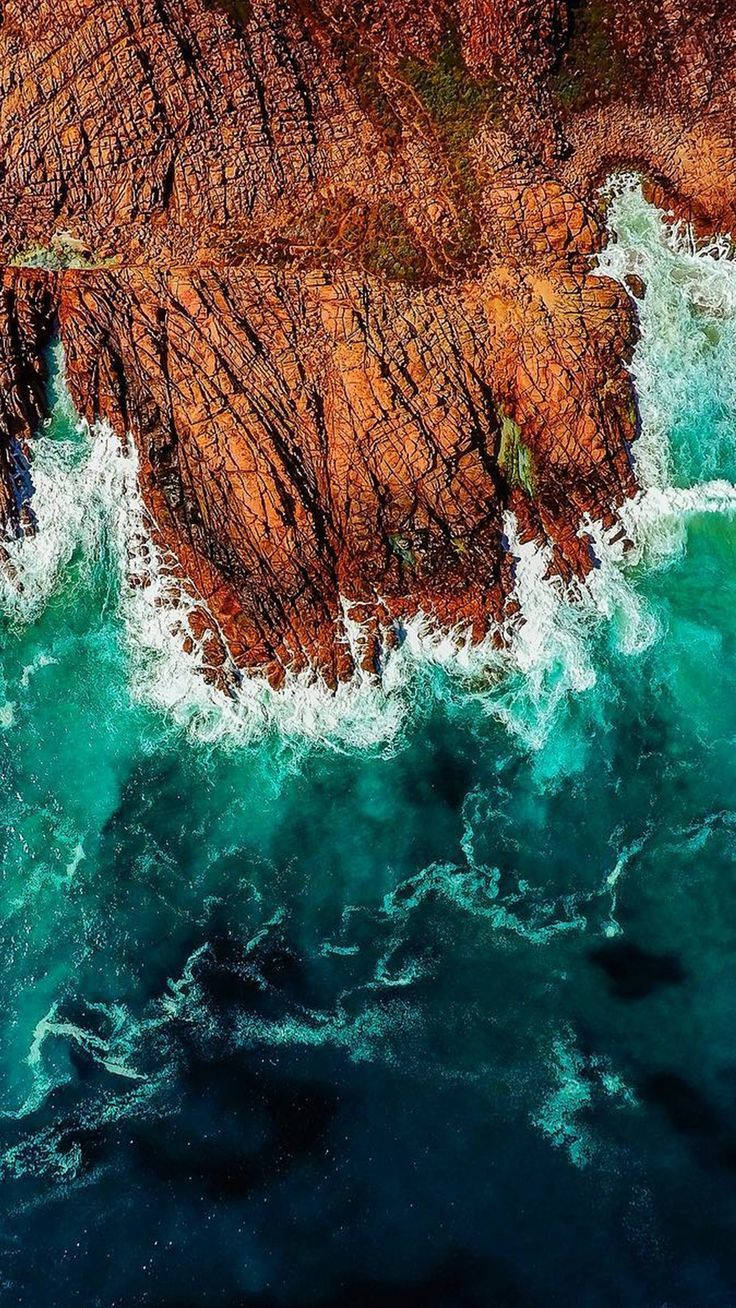 Download Ocean Waves Crashing Into Shore iPhone Wallpaper