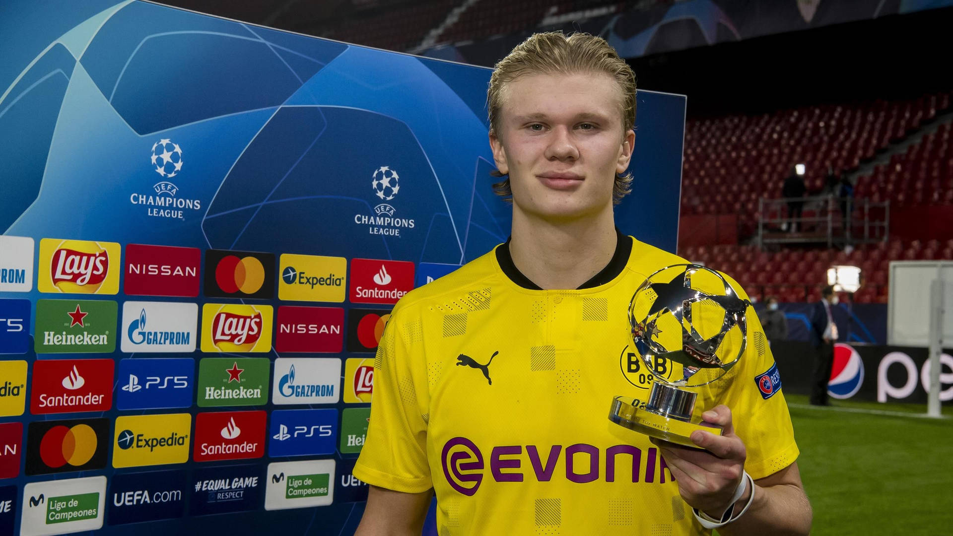 Download Erling Haaland With Trophy Wallpaper