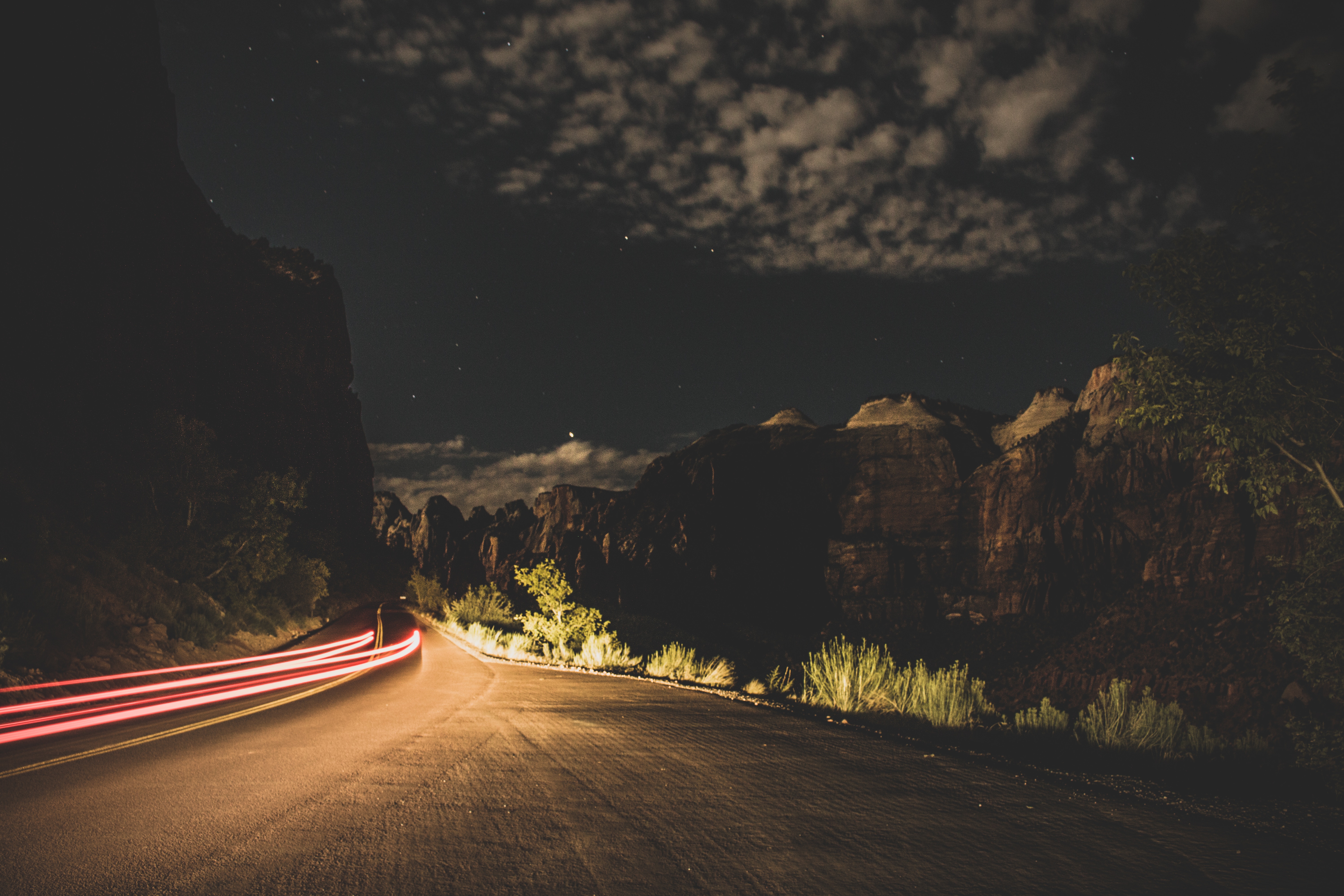 6000x4000 street, travel, night, tree, rock, tail light, light, cloudscape, outdoor, transport, long exposure, cloud, car, road, sky, PNG image, mountain, night sky, star, outside, evening Gallery HD Wallpaper