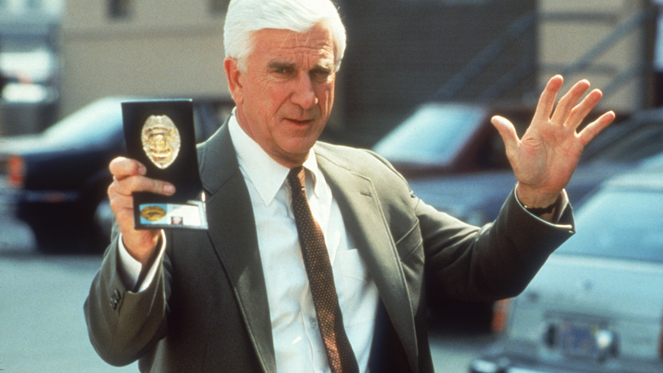 1330x748 leslie nielsen computer background