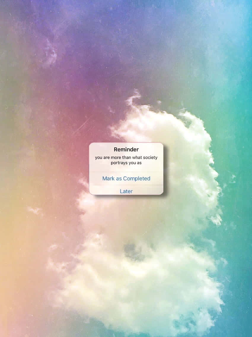 Download A Colorful Cloud With A Message On It Wallpaper