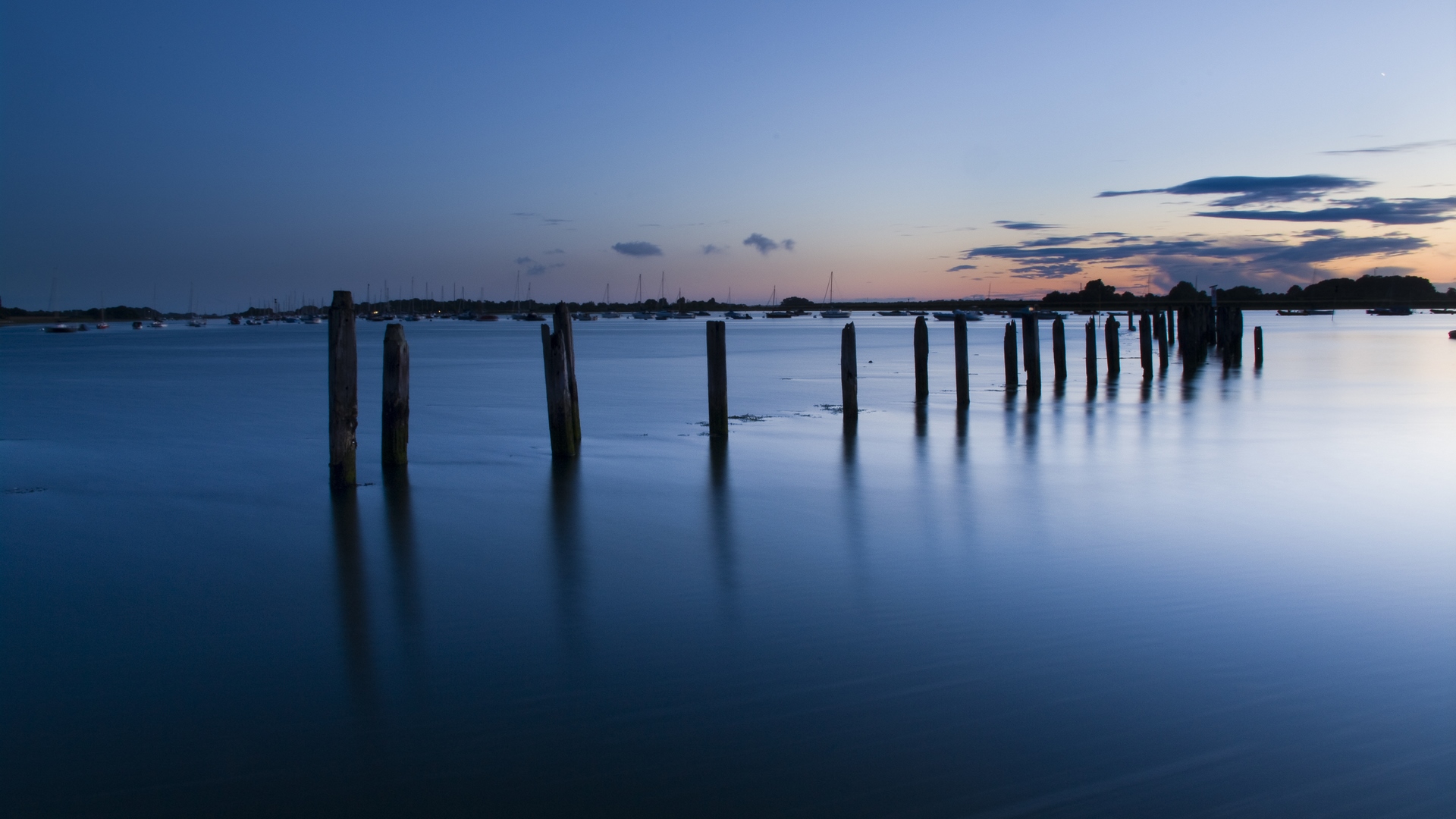 Wallpaper / calm, boats, harbour, clear, ocean, pylons, sky, night free download