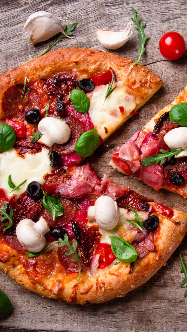 Italian Pizza with salami, mozzarella and olives for lunch or dinner