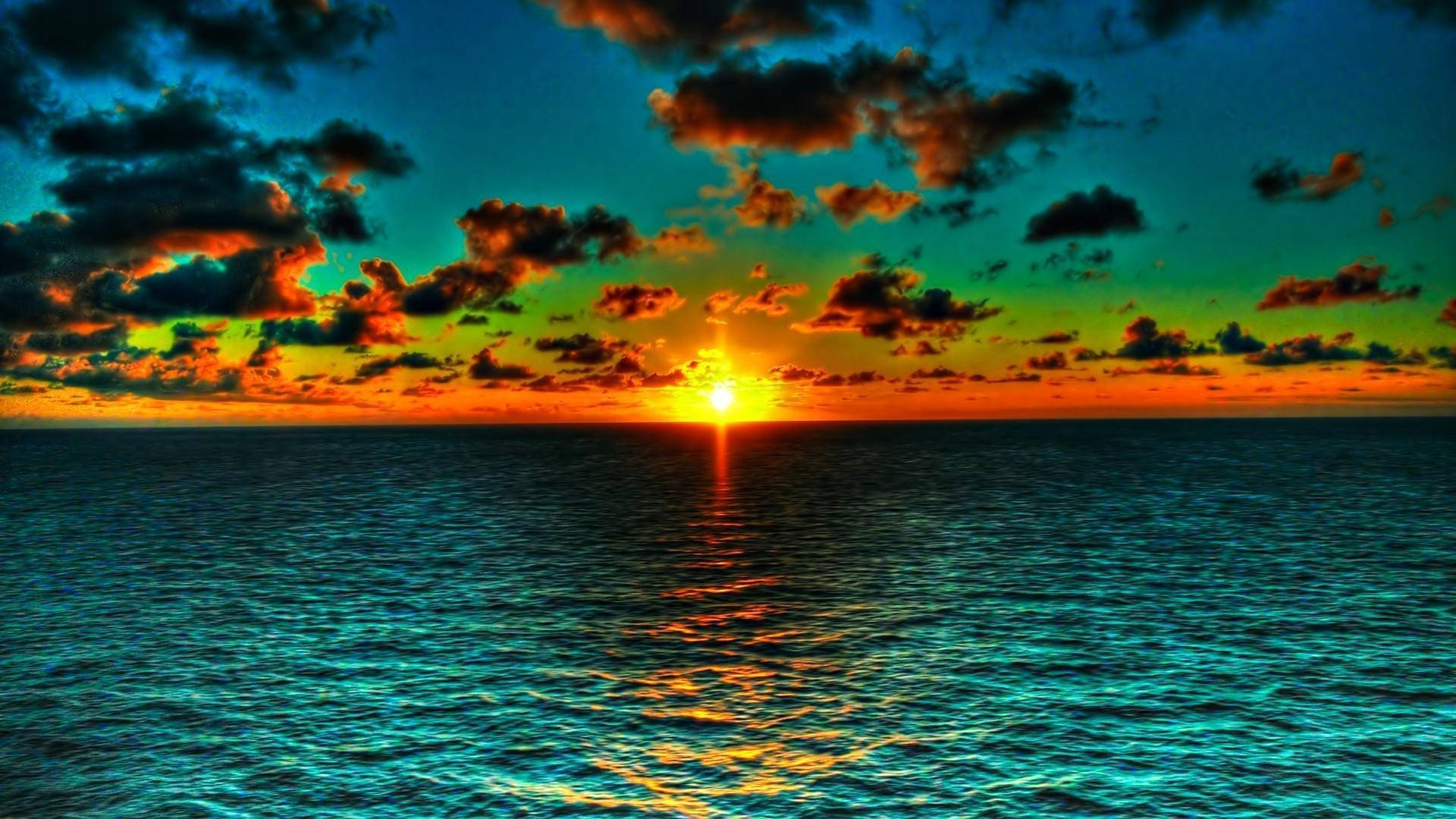 Download Green Ocean Sunset Wallpaper