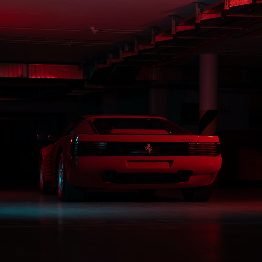 Red car on a parking lot photo