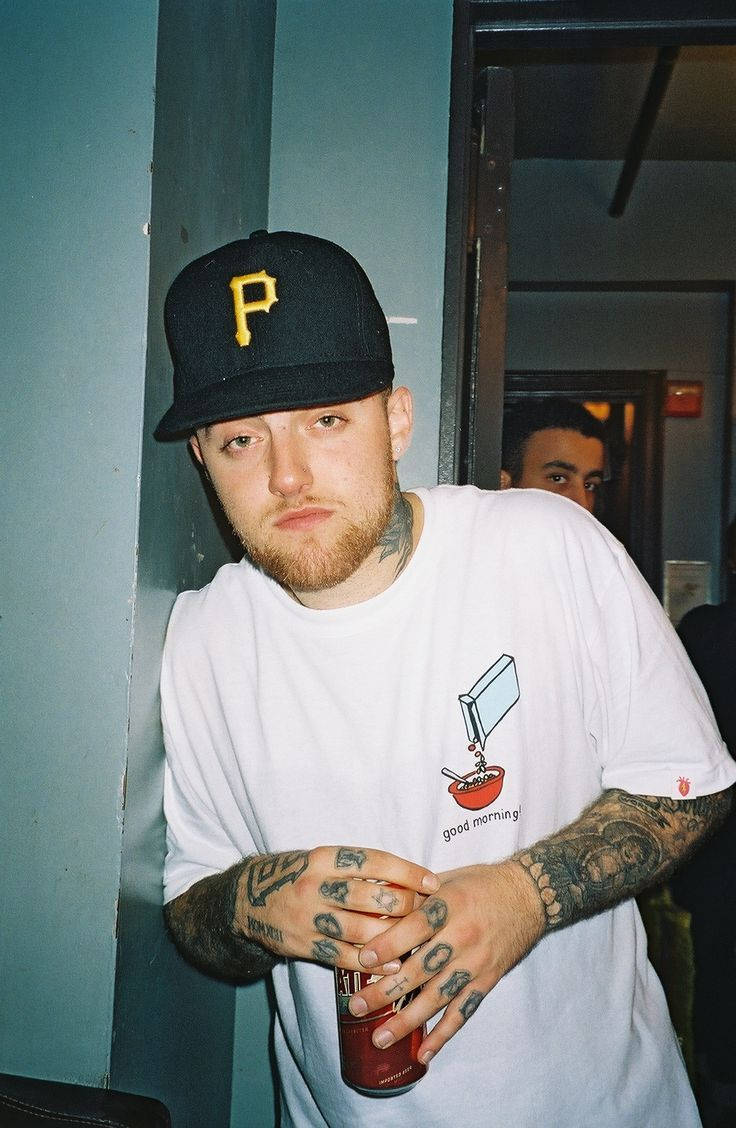 Download Mac Miller Holding Soda Can Wallpaper