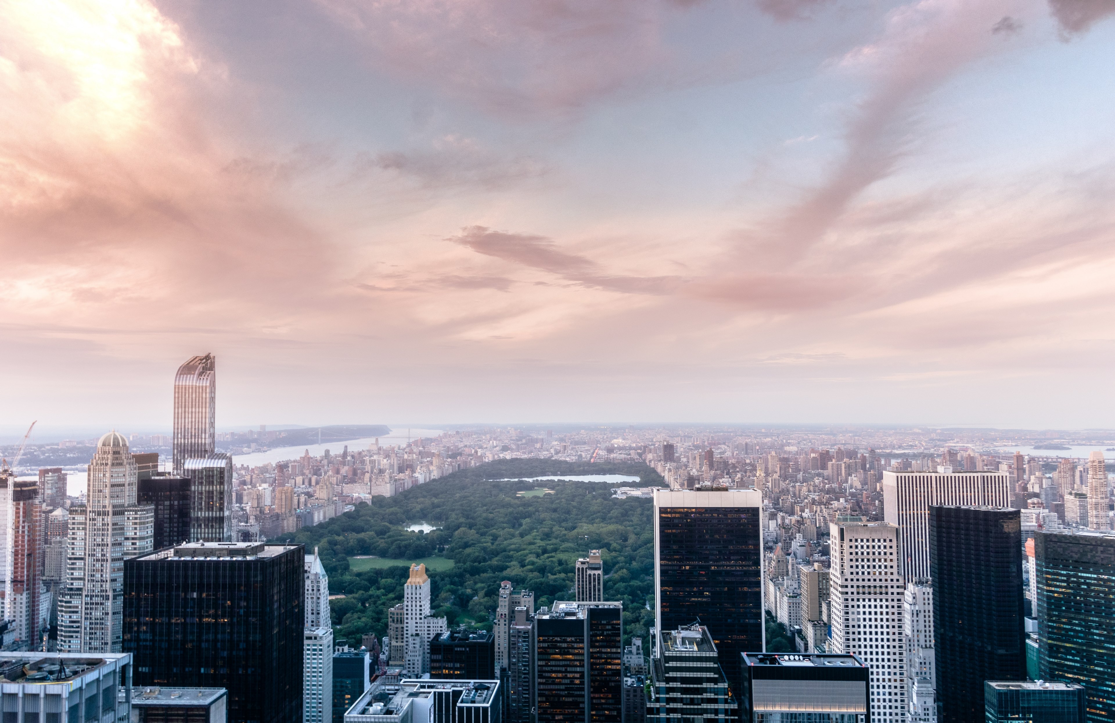 Wallpaper / the central park in new york on a cloudy day, concrete jungle nyc central park sunset views 4k wallpaper free download