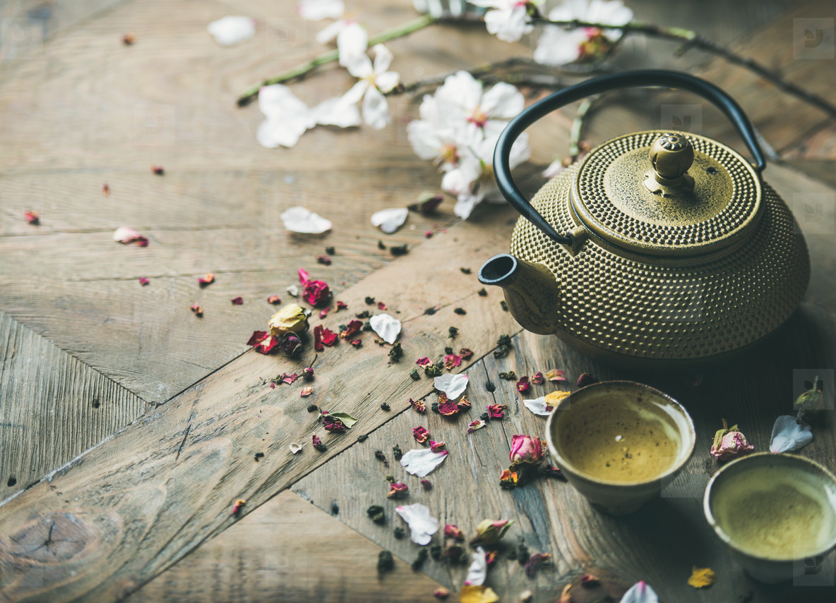 Traditional Asian tea ceremony arrangement over rustic background, copy space