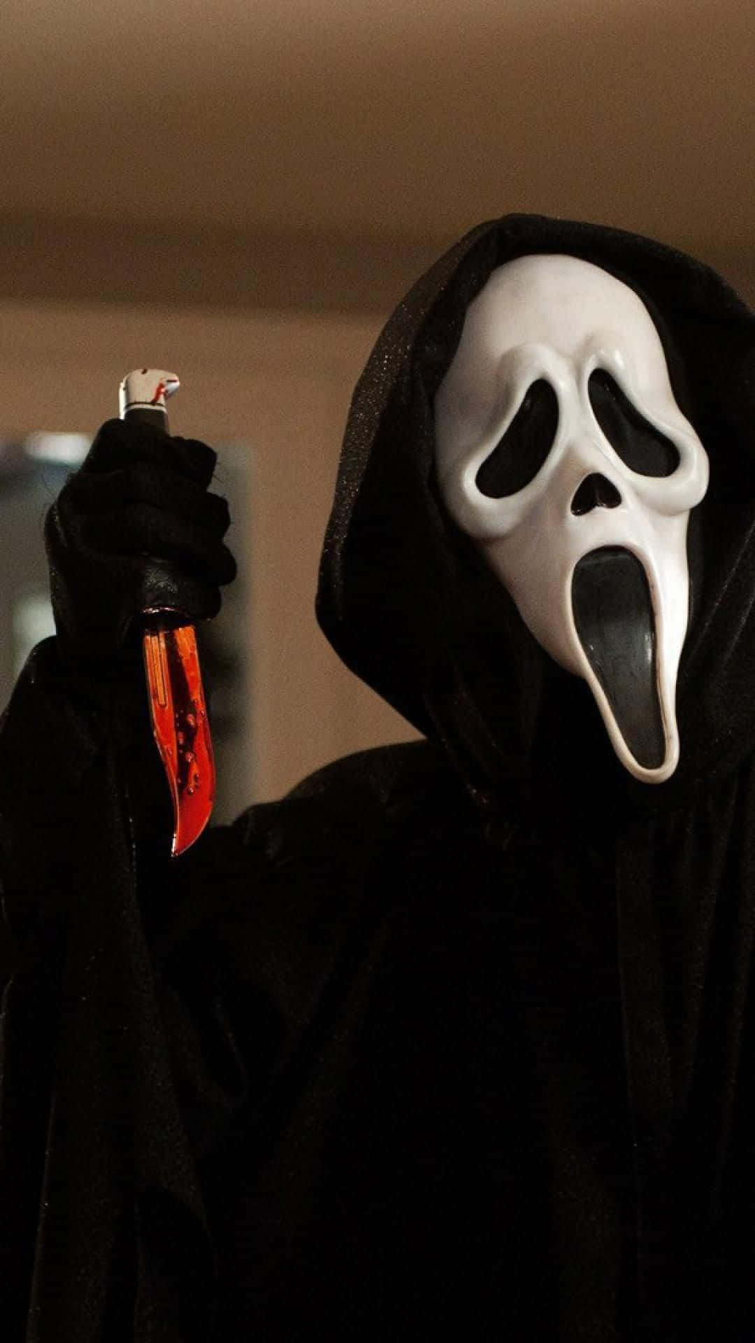Download Scream Ghostface Wielding Bloody Knife Wallpaper