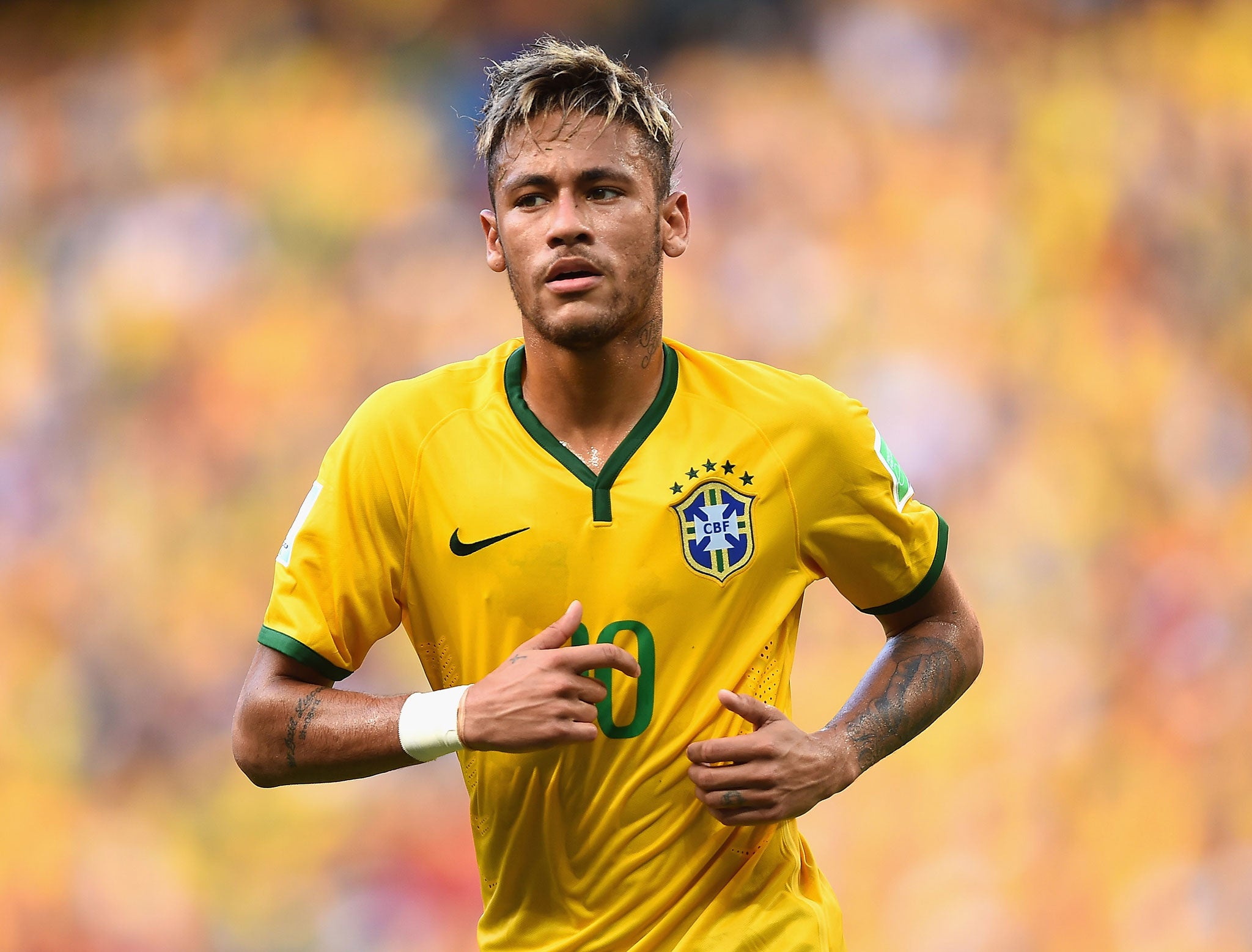 World Cup 2014: Neymar is Brazil's golden boy but who is the man behind the ball?
