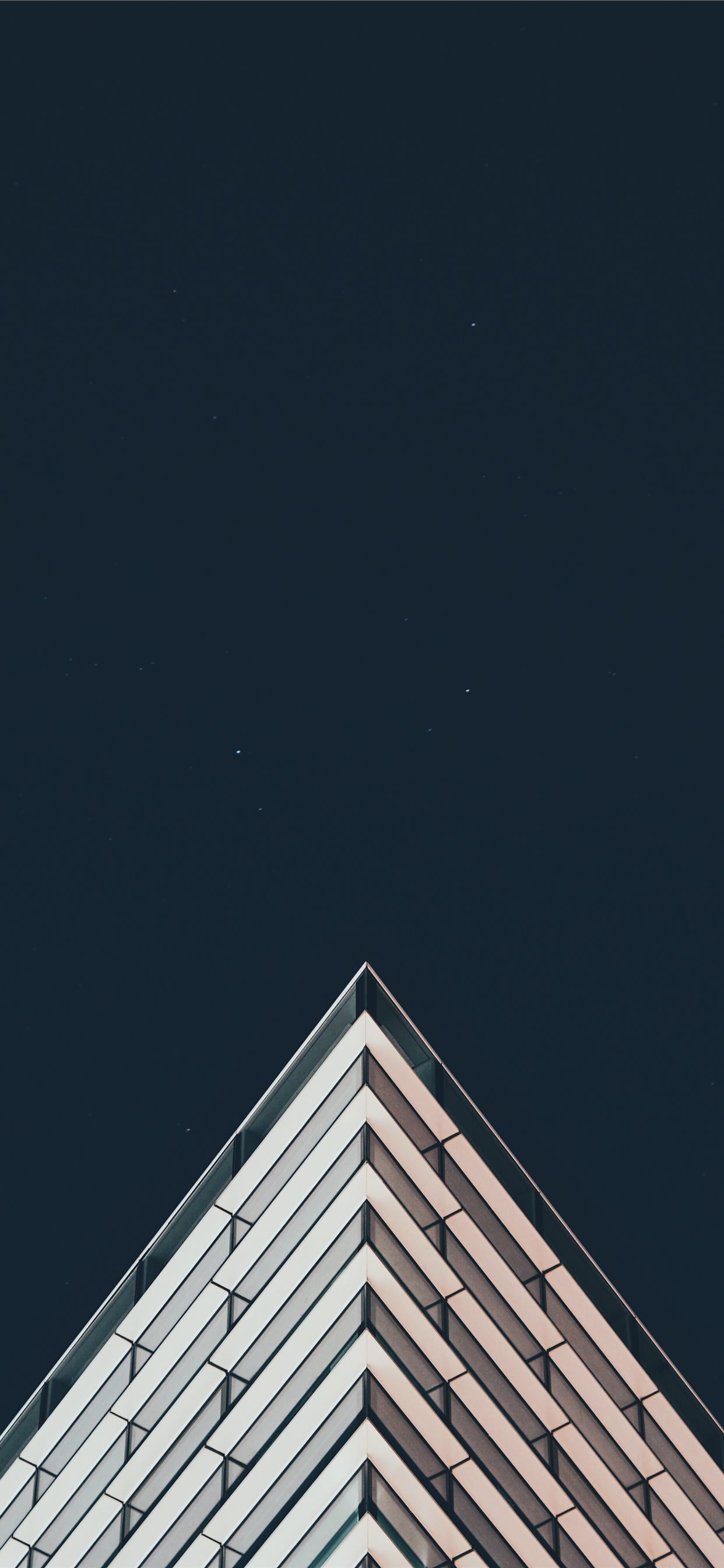 white building under stars iPhone X Wallpaper Free Download