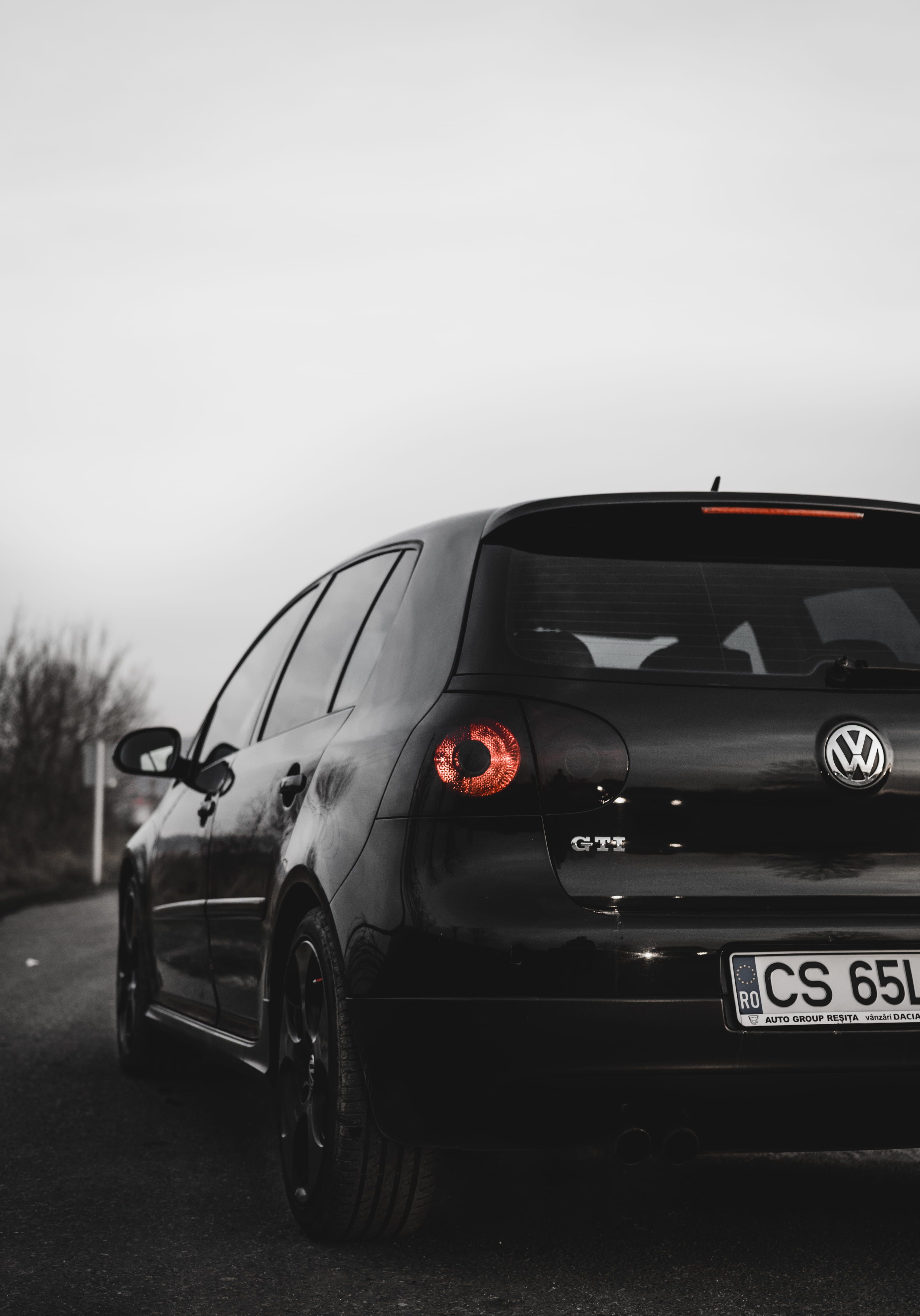 black Volkswagen Polo GTI grayscale closeup photography, shallow focus photo of black Volkswagen SUV #vehicle #vw #volkswagen. Volkswagen polo, Volkswagen, Autos