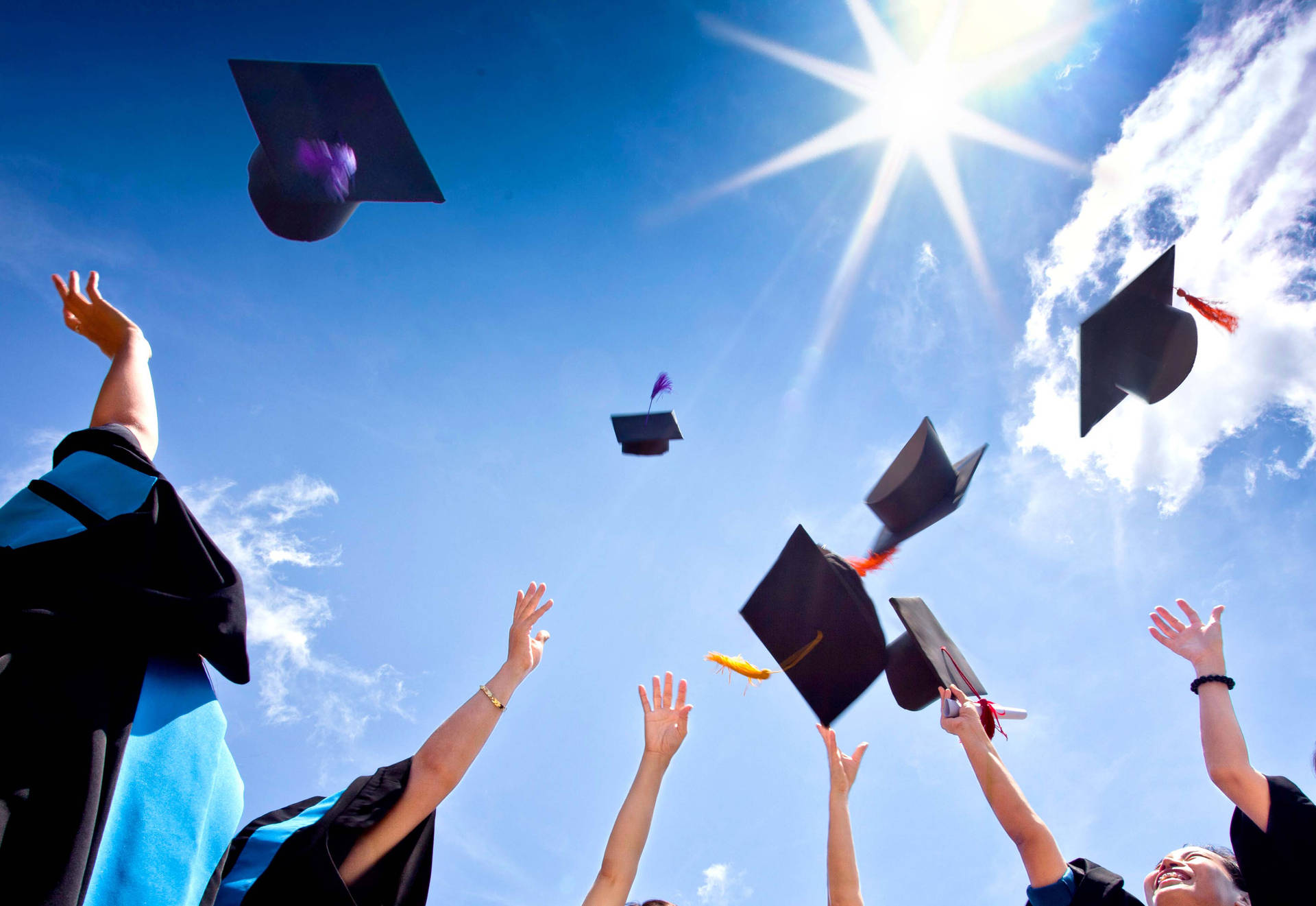 Download Graduation Cap Toss Wallpaper