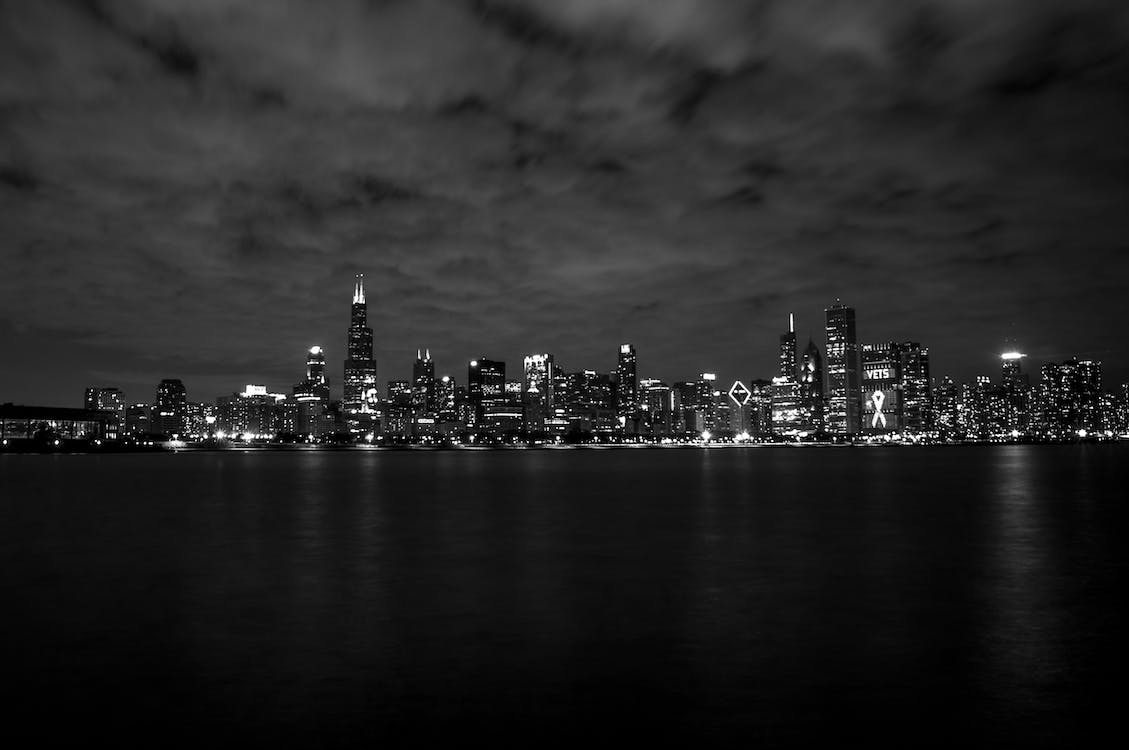 Gray Scale of City Skyline Photography · Free