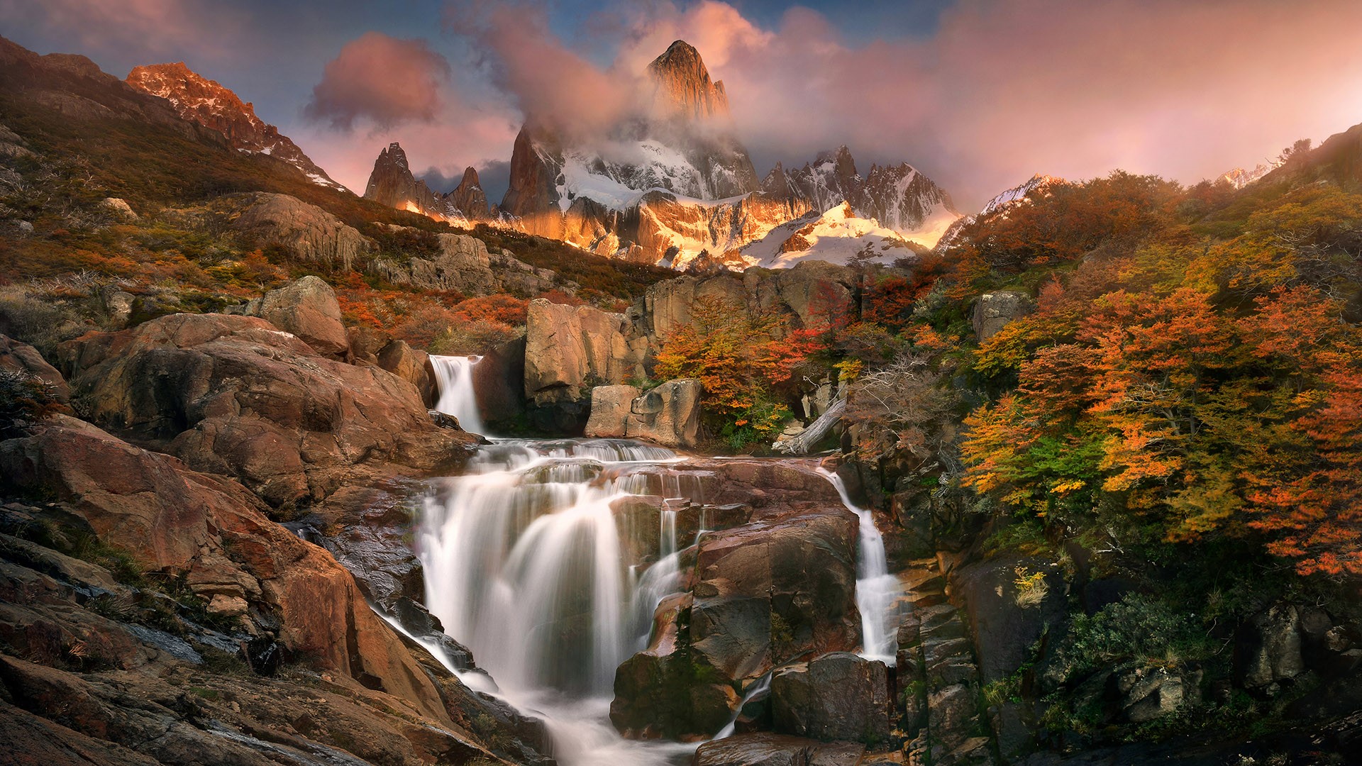 Waterfall with Mount Fitz Roy in autumn, Los Glaciares National Park, El Chaltén, Argentina. Windows 10 Spotlight Image