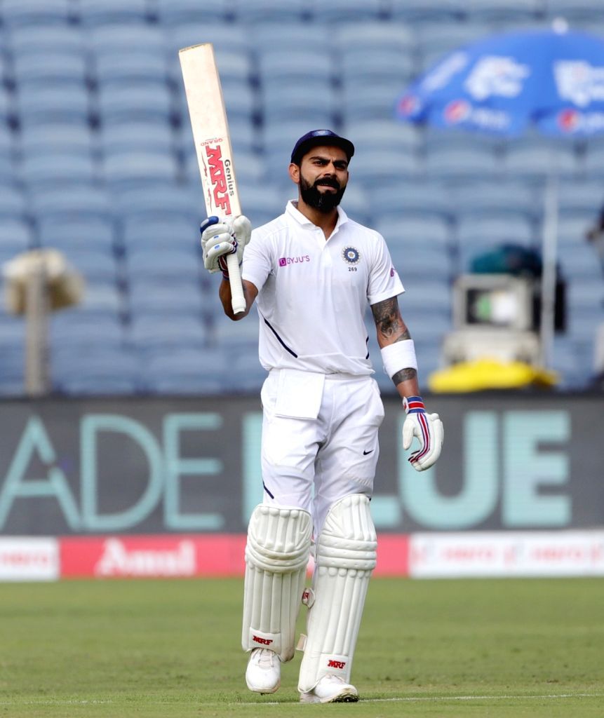 Pune: Indian skipper Virat Kohli celebrates his double century on Day 2 of the second Test matc. Virat kohli wallpaper, Virat kohli instagram, India cricket team