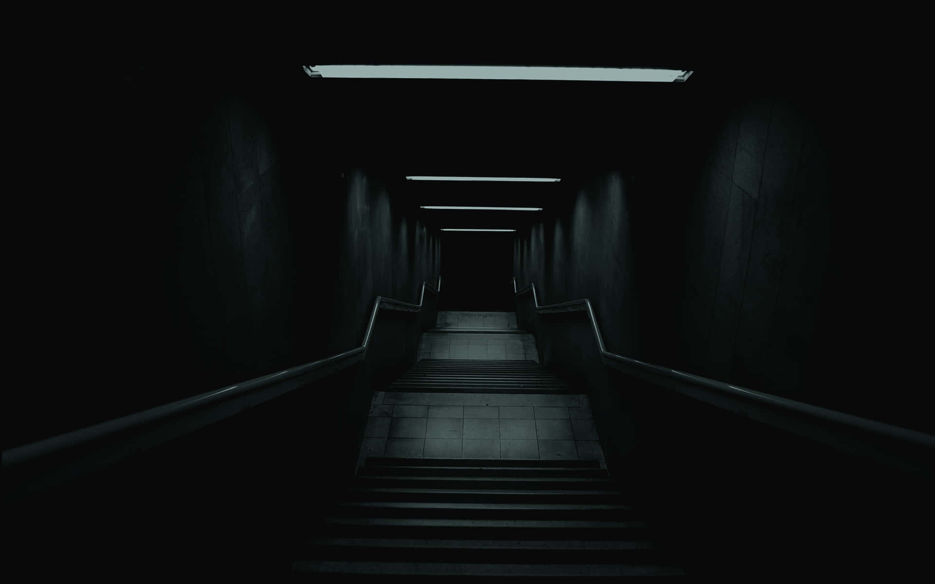 Download dark hallway with stairs leading to a dark room