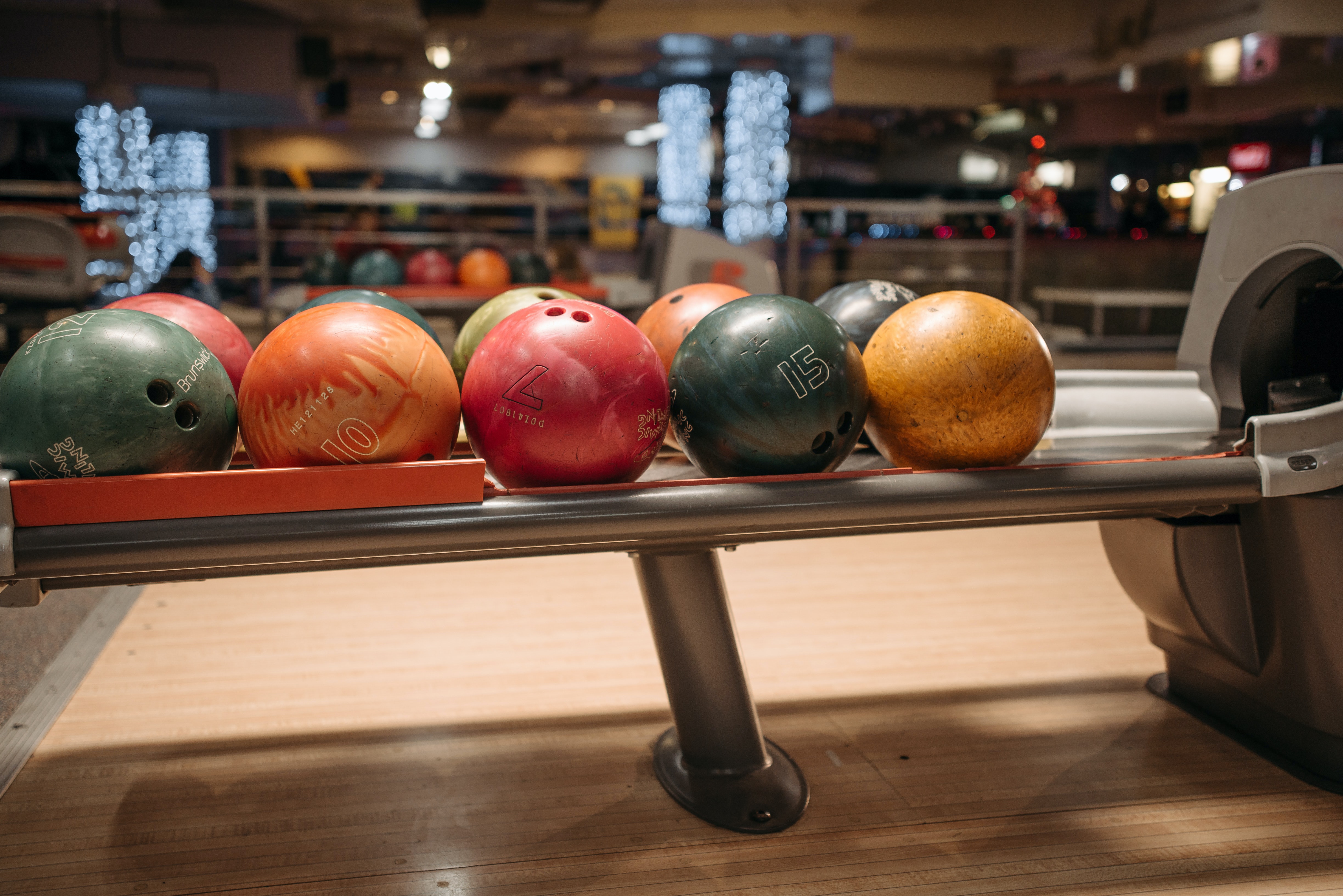 Colorful Bowling Balls on a Return System · Free