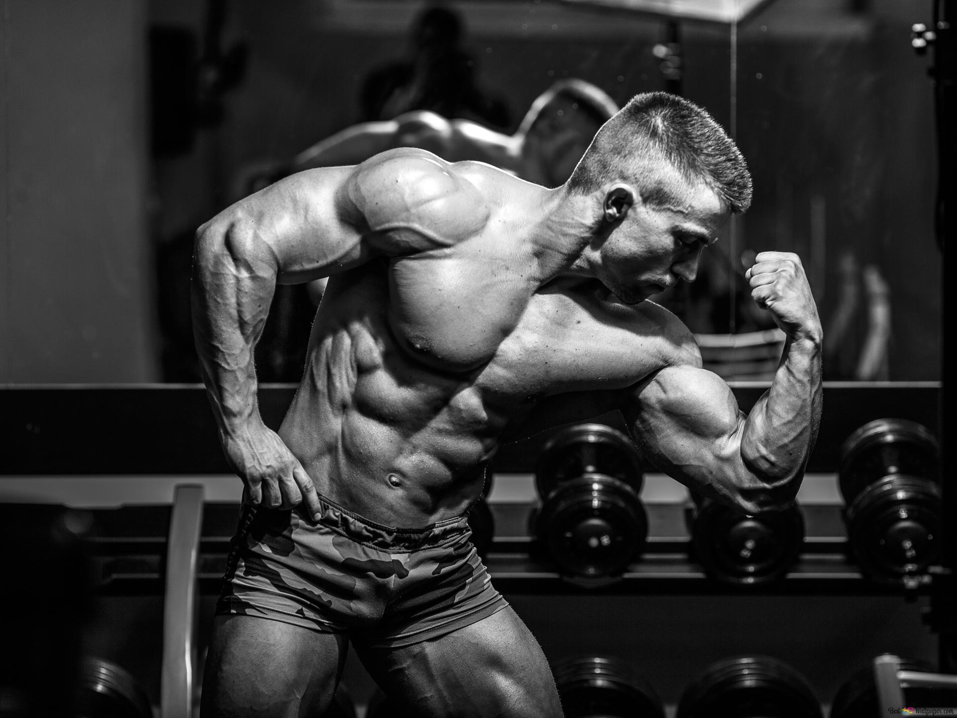 Gym bodybuilder showing off his muscles black and white photo 4K wallpaper download