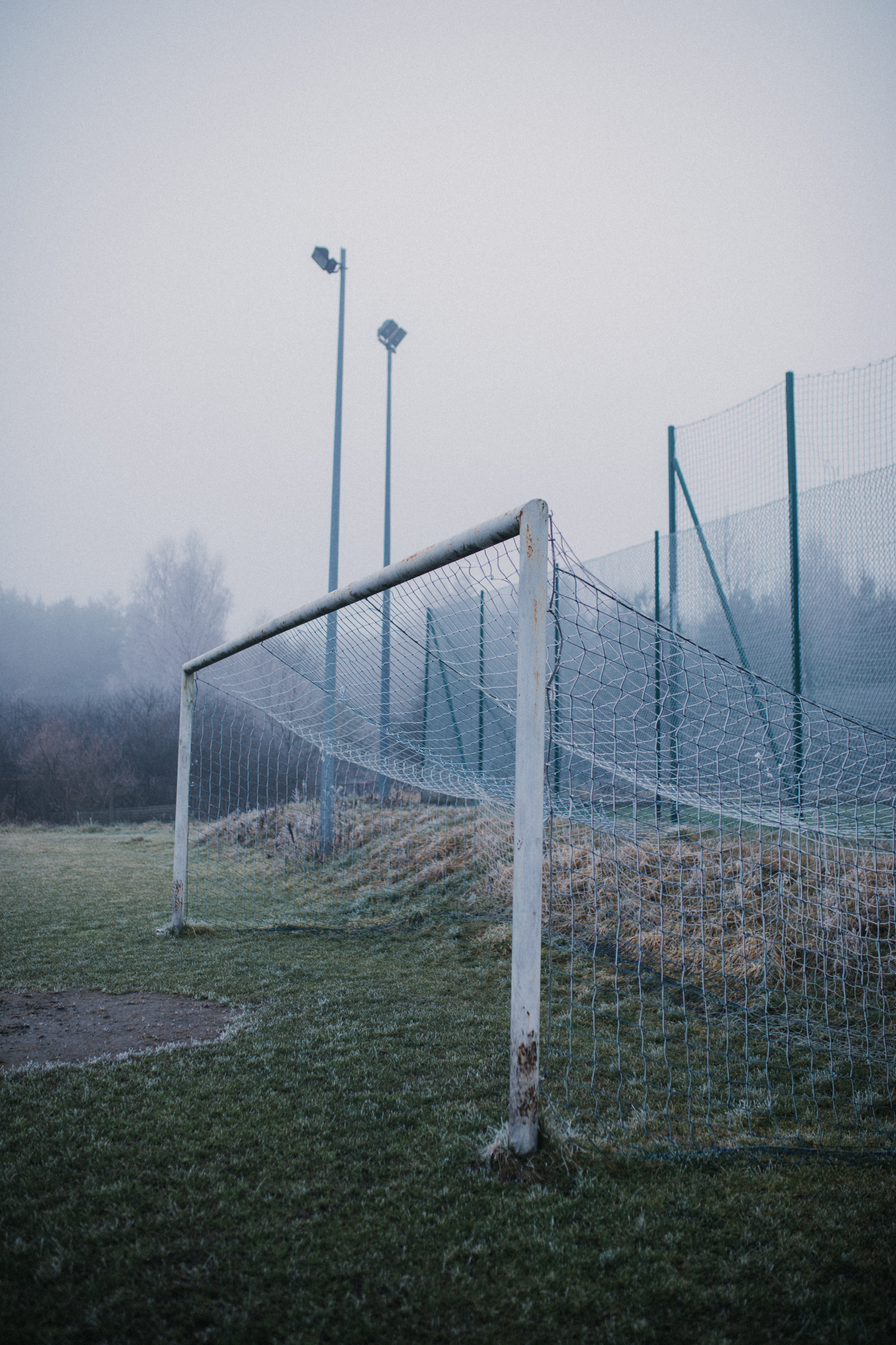 Soccer Goal on Grass Field on a Foggy Day · Free