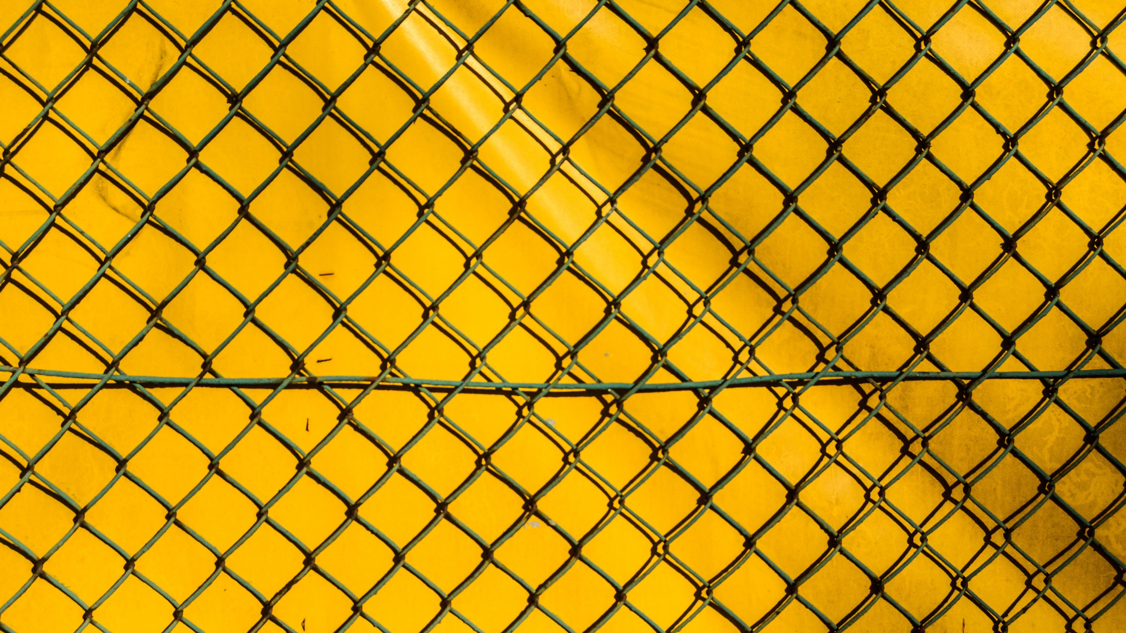 Wallpaper / the fence the grid yellow chain link fence model 4k wallpaper free download