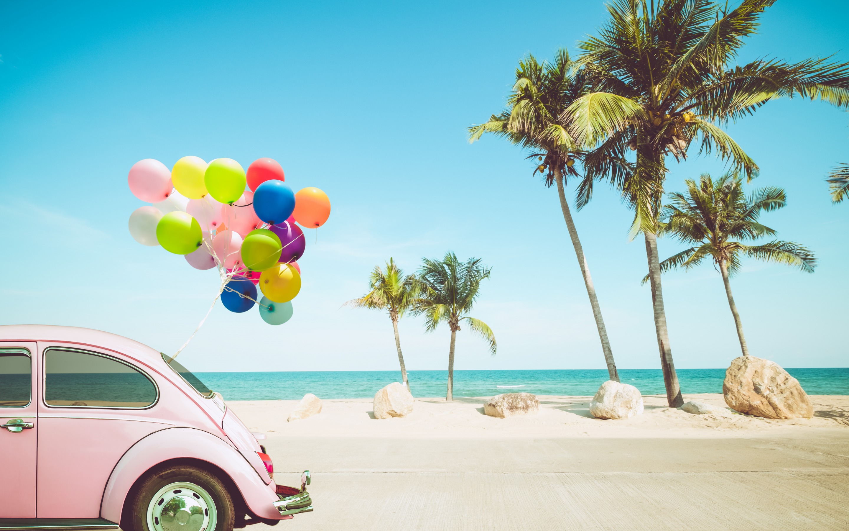 Download wallpaper summer travel, tropical island, pink retro car, seascape, bunch of colorful baloons, summer, palms, ocean for desktop with resolution 2880x1800. High Quality HD picture wallpaper