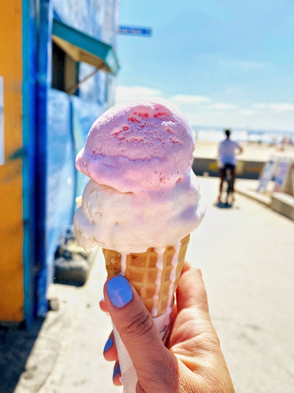 Pink ice cream on cone photo