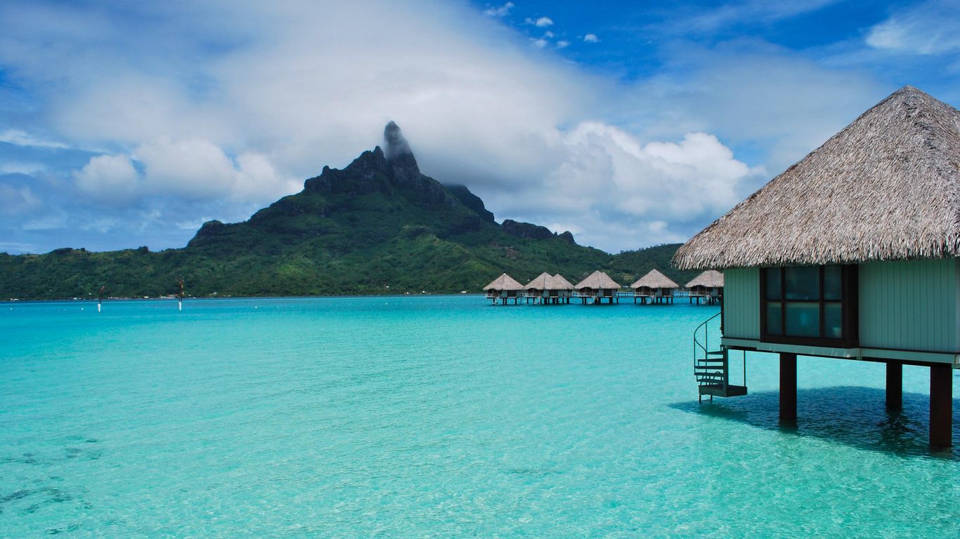 Download wallpaper 1366x768 tropical, bungalows, sea, beautiful, summer tablet, laptop HD background