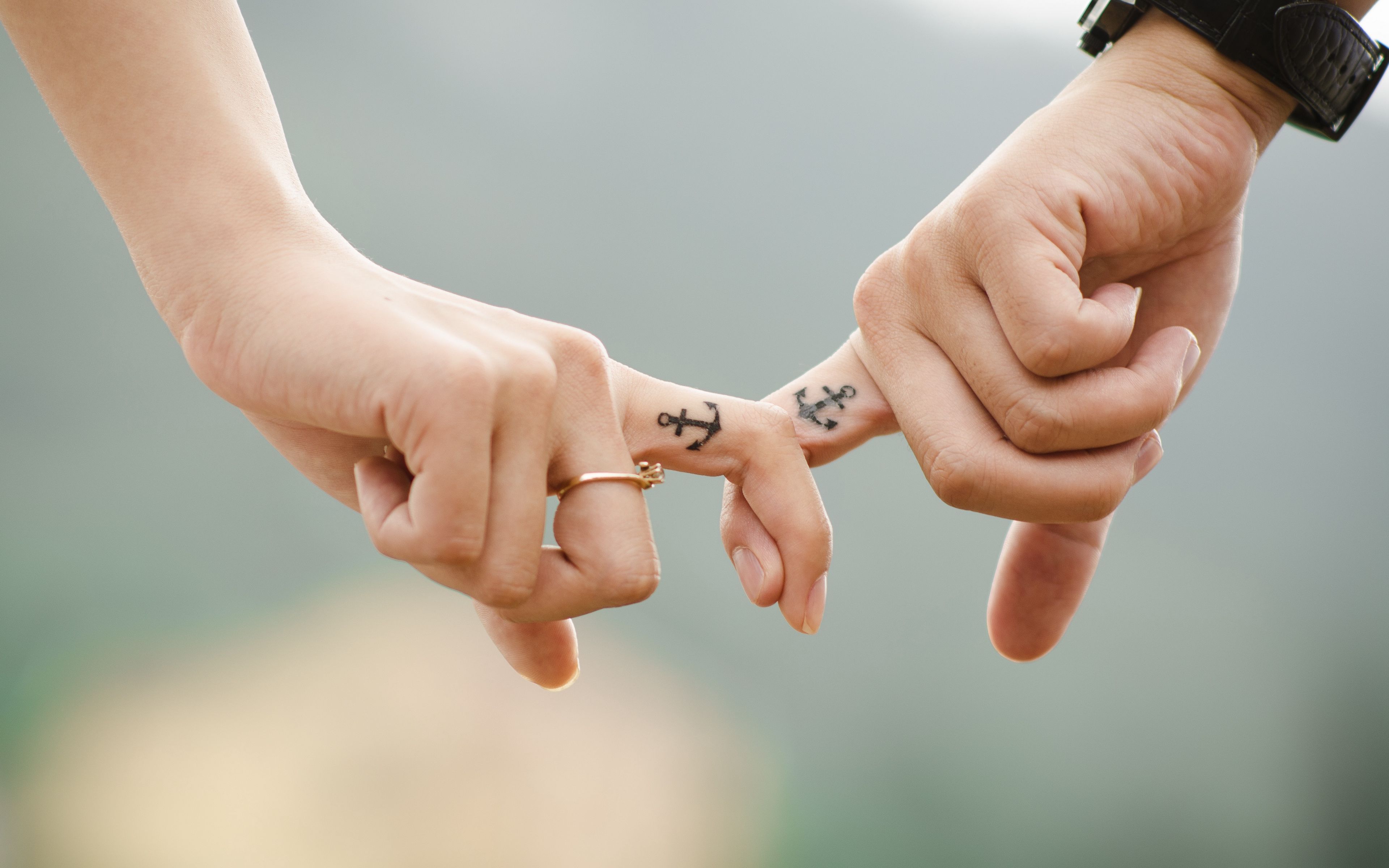 Download wallpaper 3840x2400 love, hands, romance, tattoos, couple, anchor 4k ultra HD 16:10 HD background