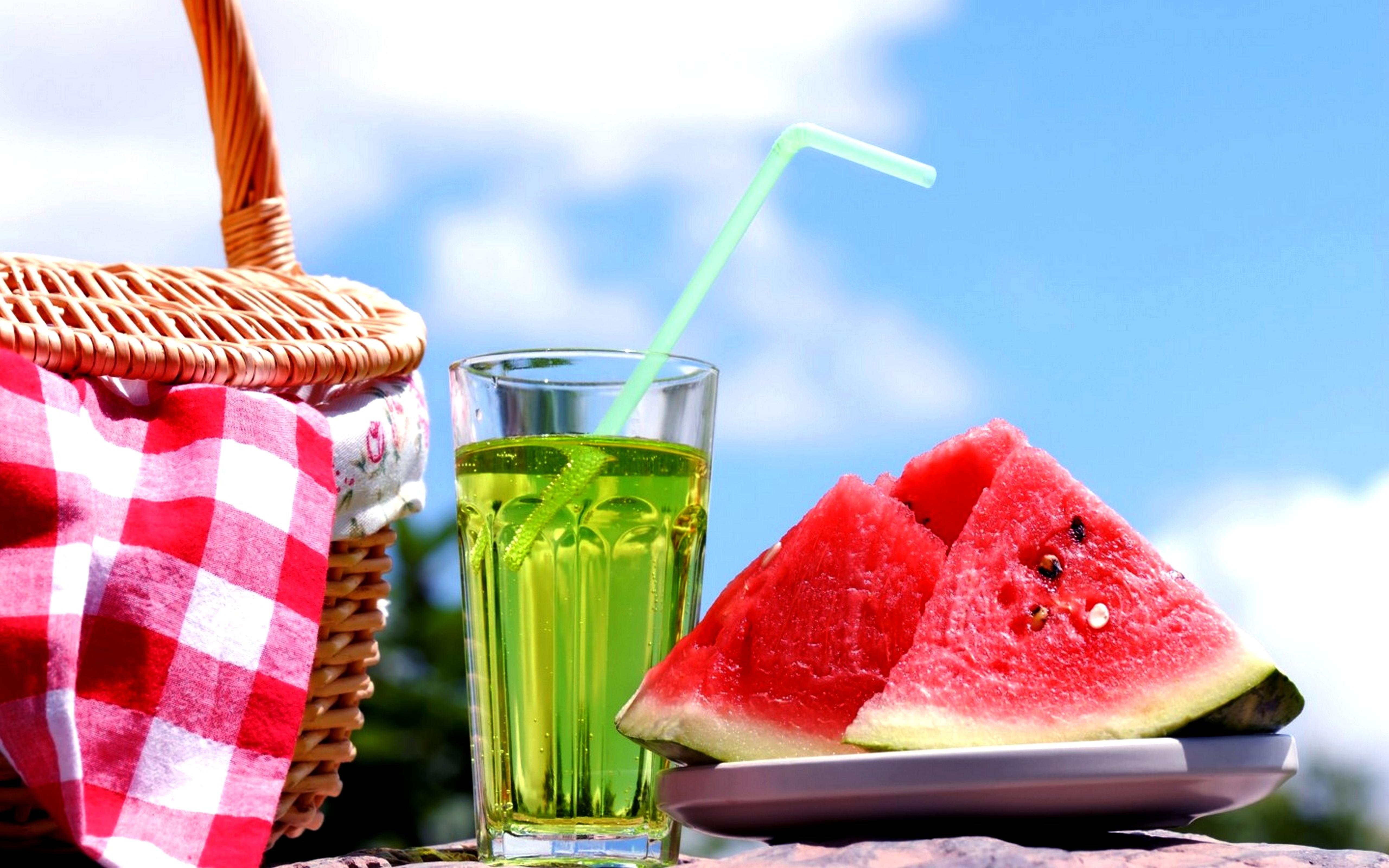 Slices of watermelon and a fresh cold juice