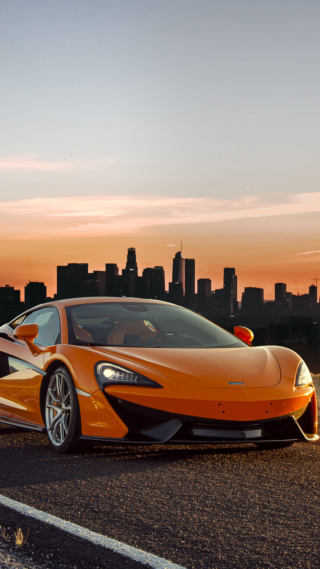 Download Orange Sunset 4K Car iPhone Wallpaper