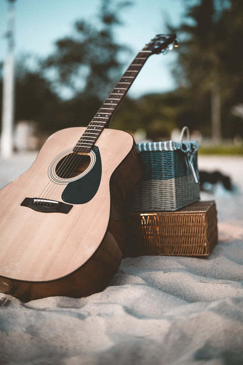Download Musical Instrument Guitar On Beach Wallpaper
