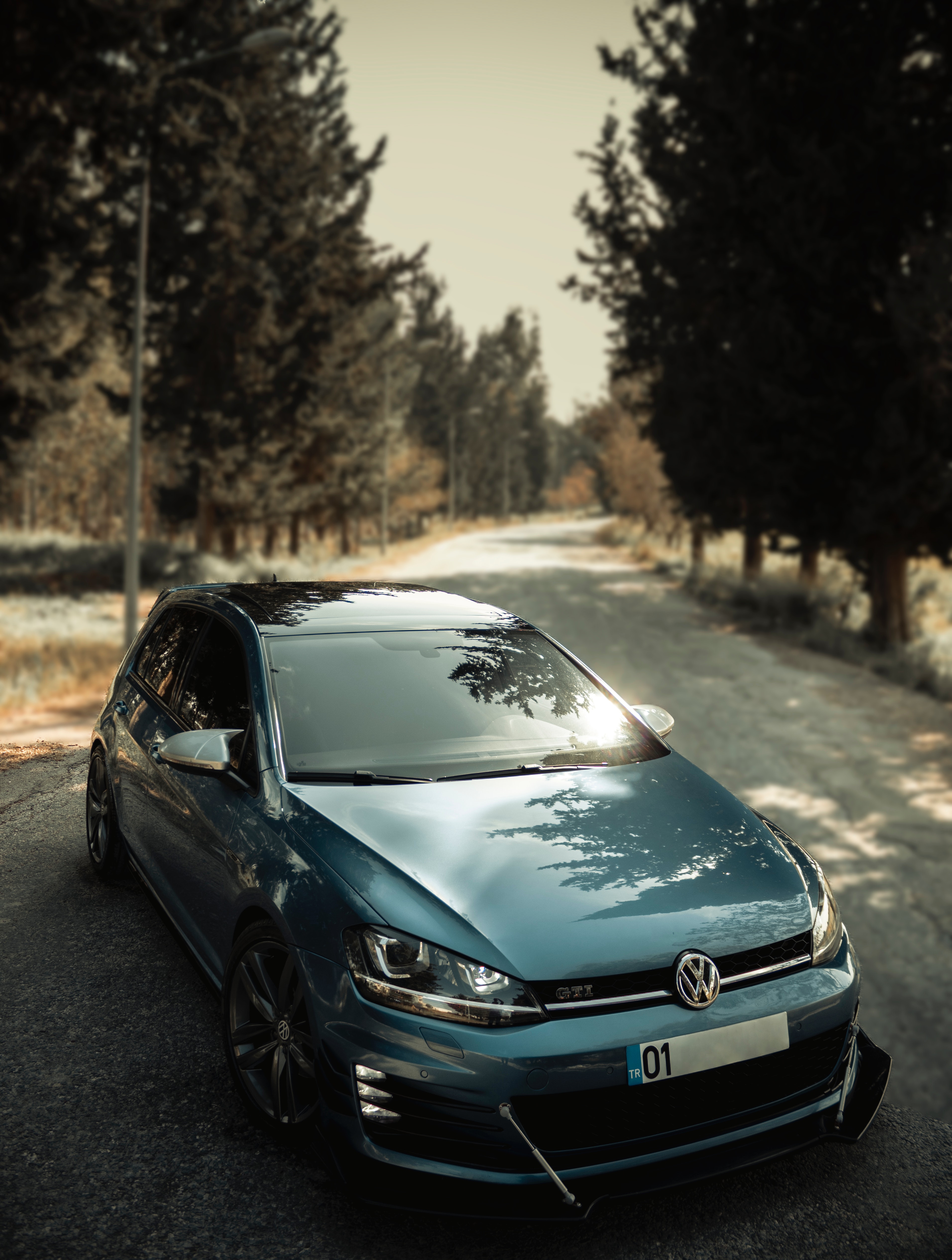 A Parked Red Volkswagen Golf GTI · Free