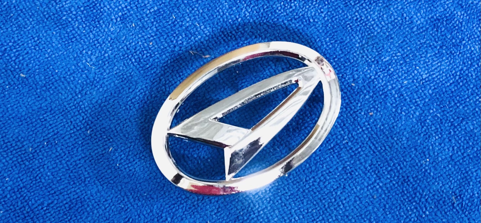 Daihatsu Mira steering logo chrome