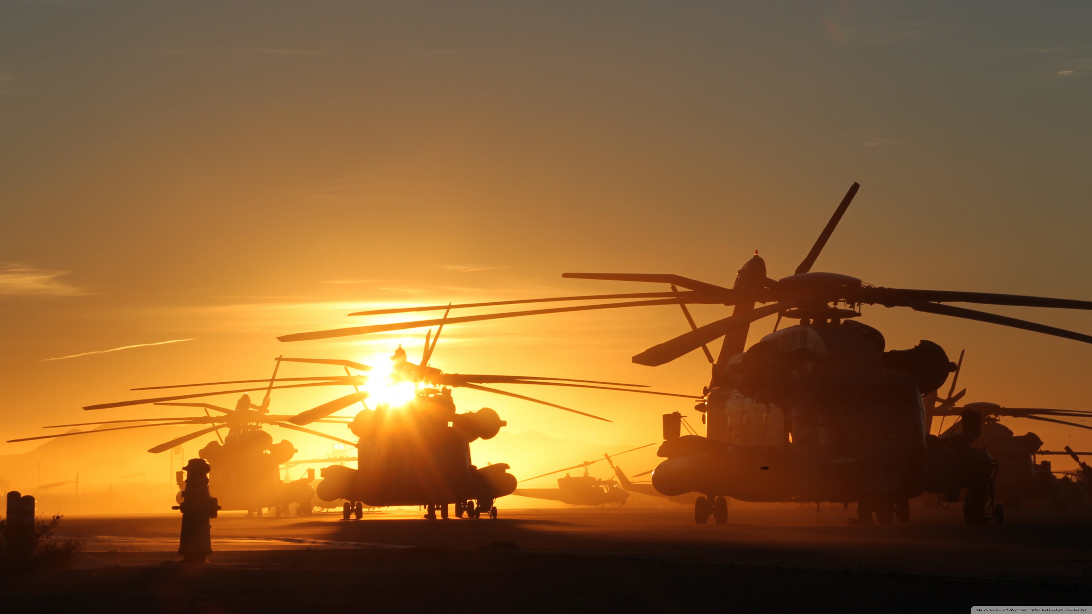 Helicopters At Sunset Ultra HD Desktop