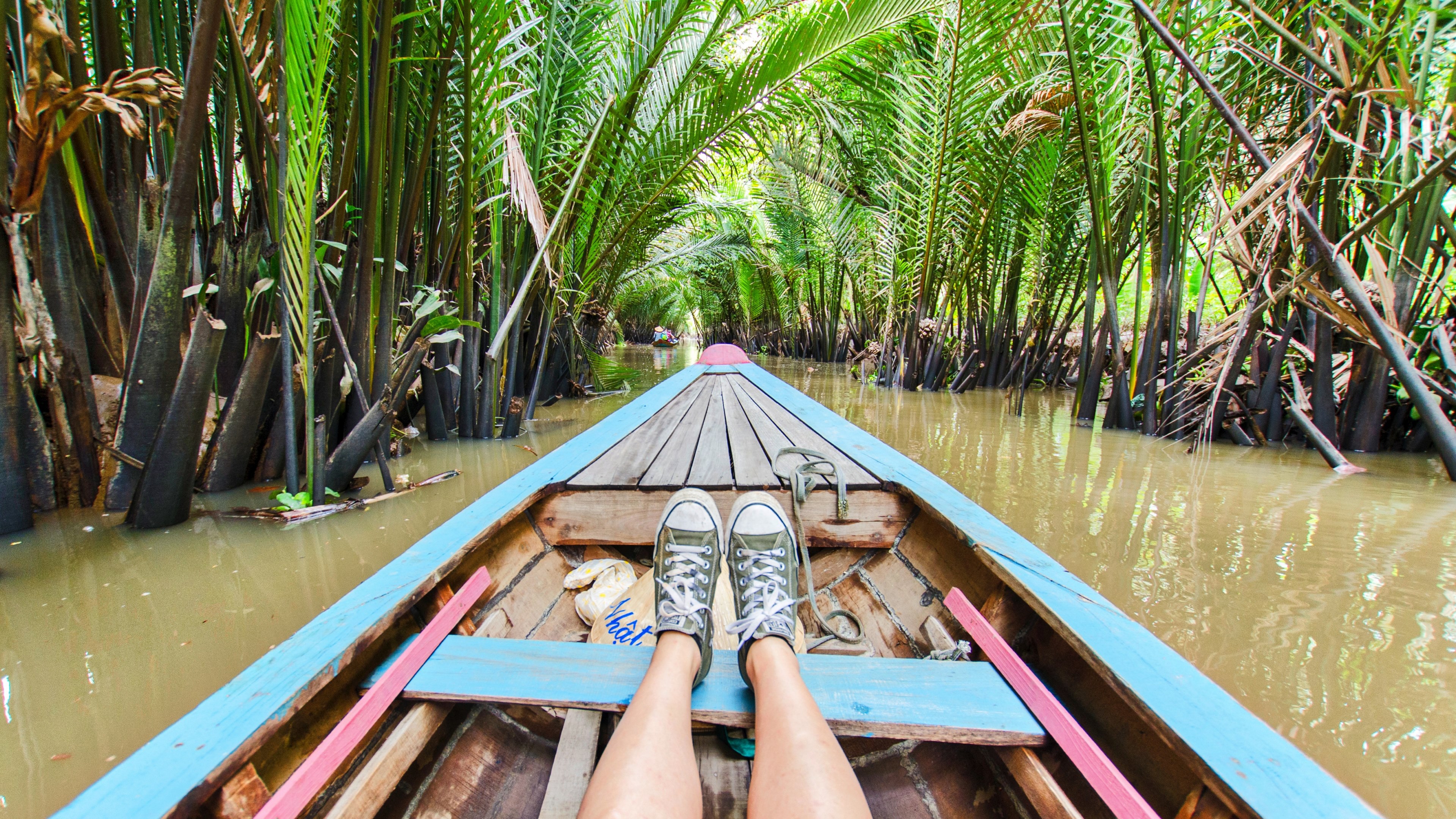boating by mekong river 4k wallpaper