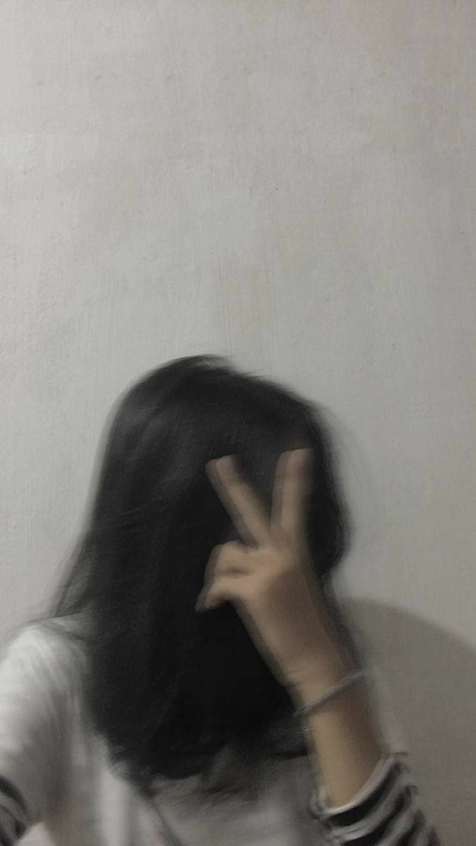 Download Blurry Girl With Peace Sign